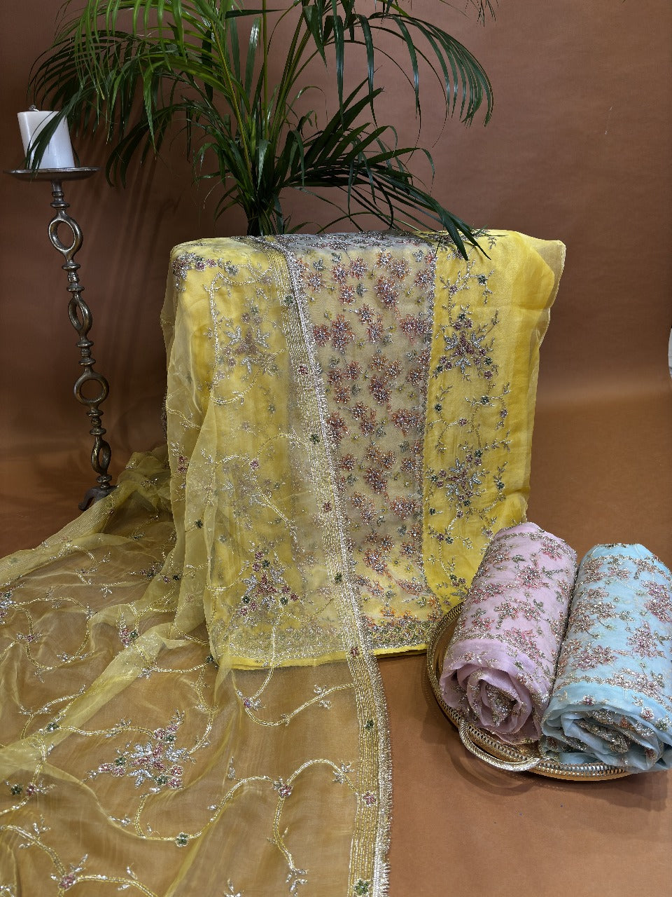 Bright Yellow fabric with floral embroidery in silver,pink,green &orange threads