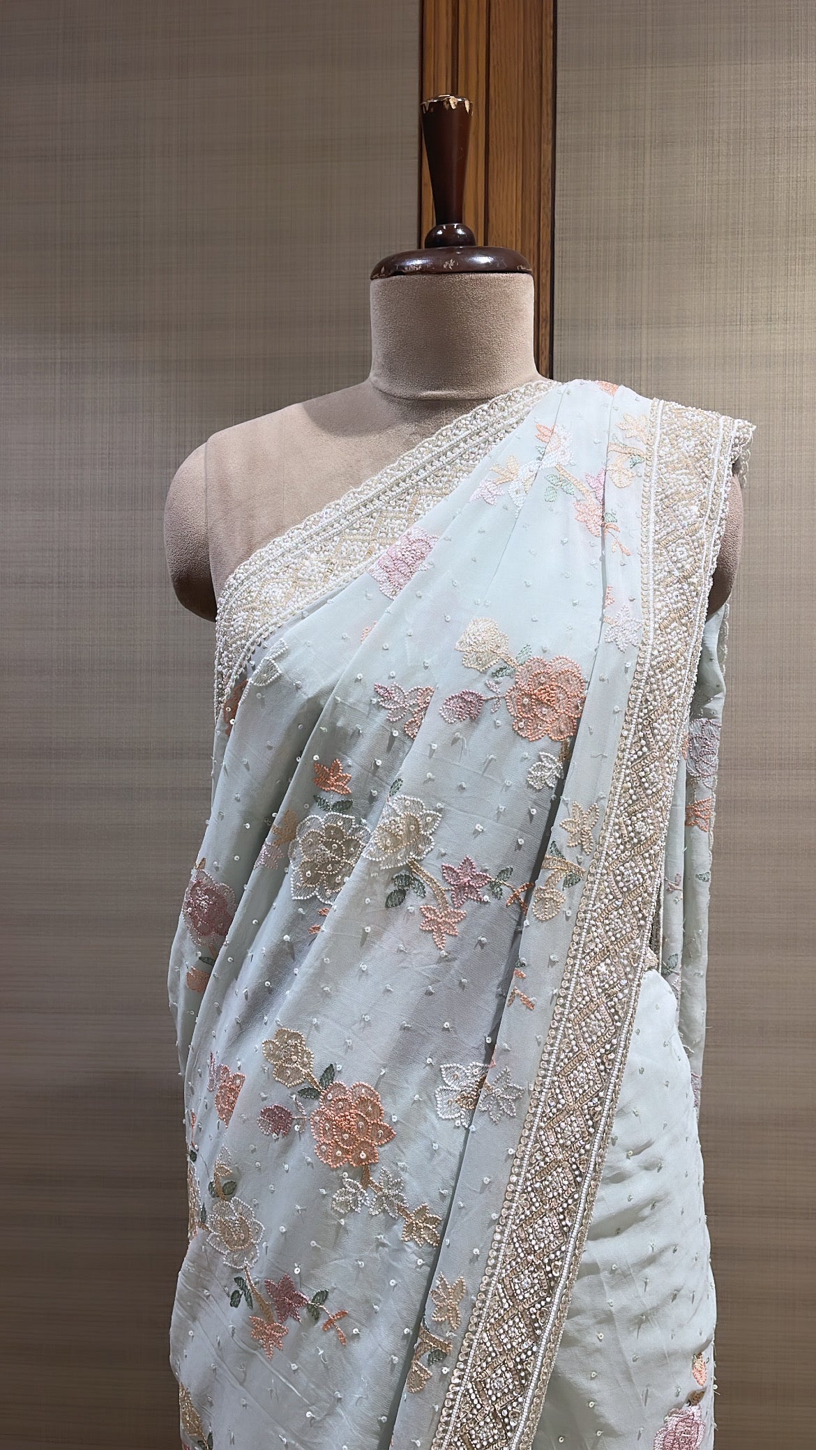 Elegant Mint Green Georgette Saree with Intricate Floral Embroidery
