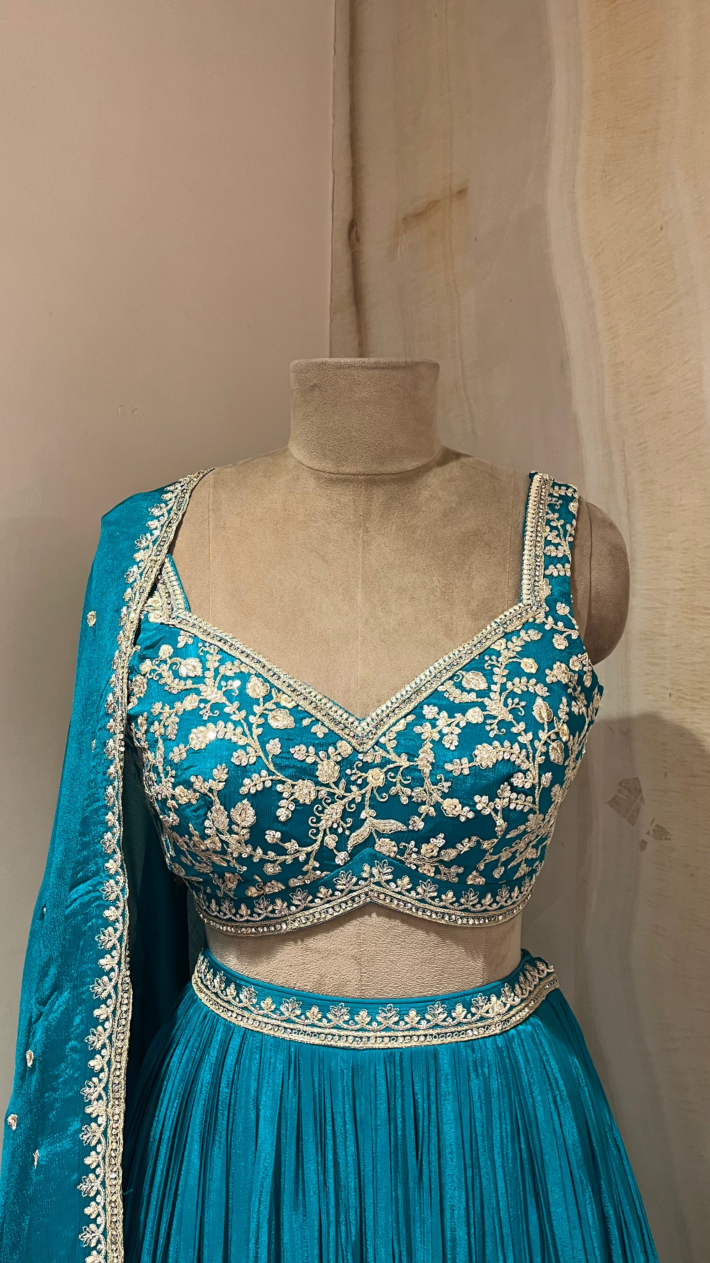 PEACOCK GREEN EMBROIDERED LEHENGA