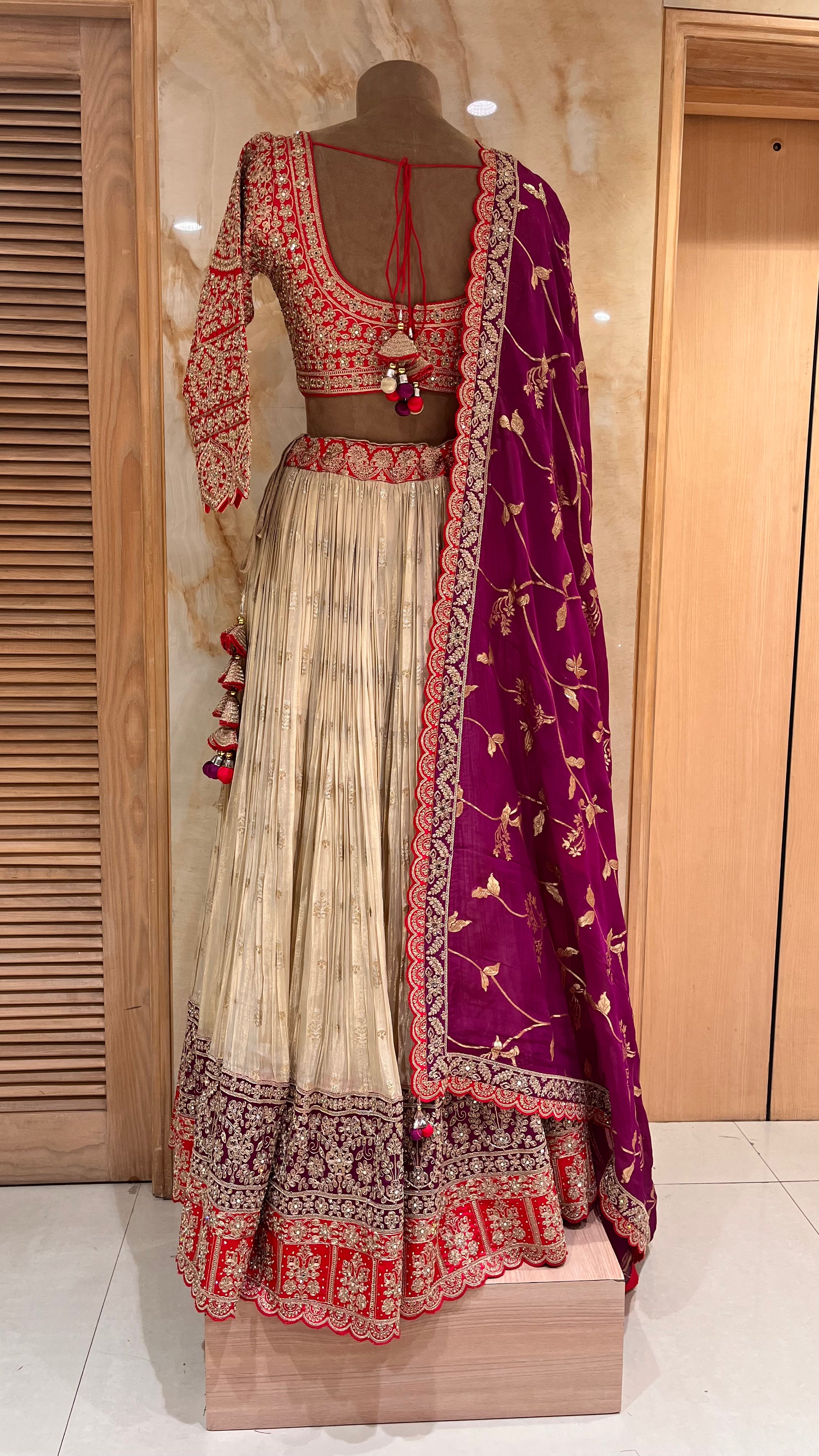 ELEGANT CREAM, ORANGE AND WINE EMBROIDERED LEHENGA SET