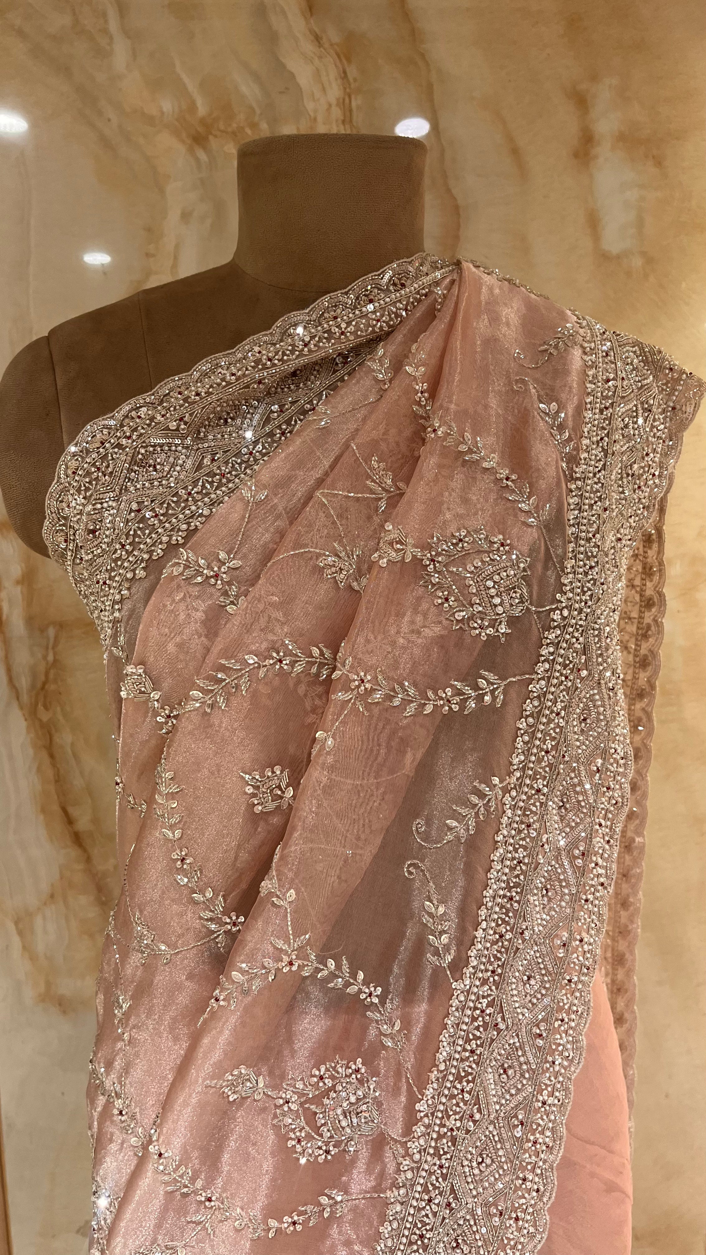 ELEGANT PEACH DESIGNER SAREE WITH HEAVY EMBROIDERED BORDER