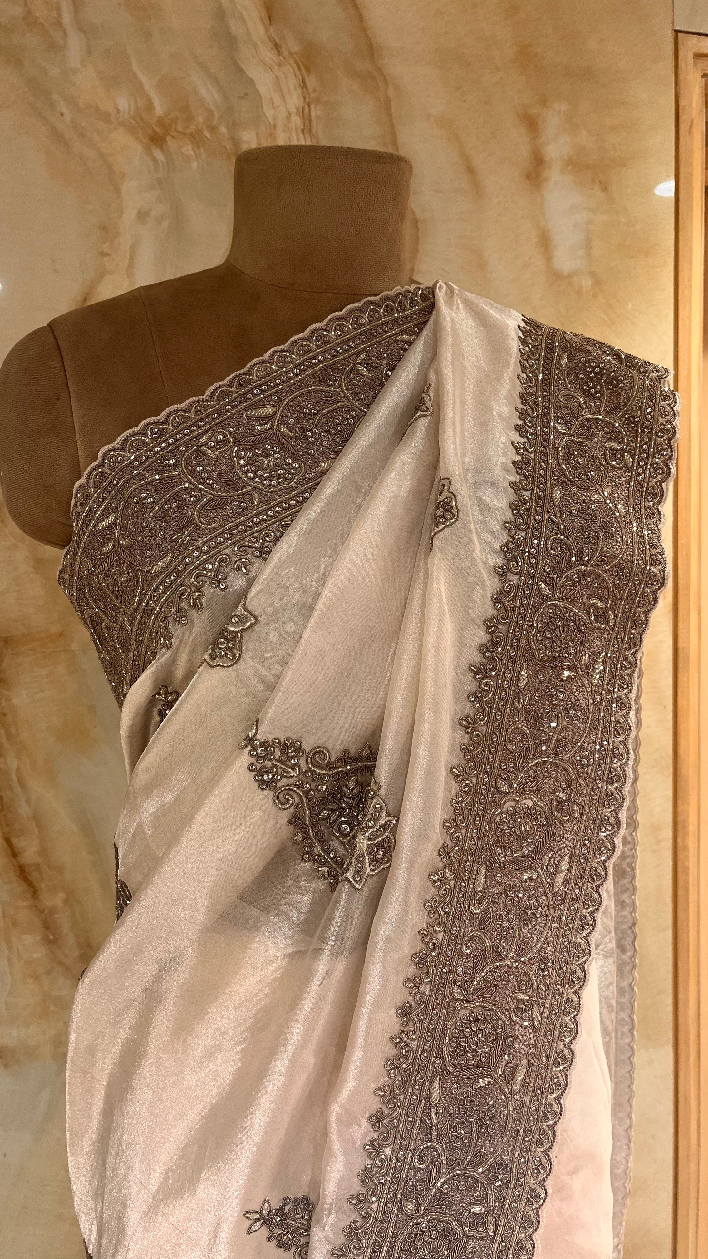 ELEGANT OFF-WHITE DESIGNER SAREE WITH HEAVY EMBROIDERED BORDER