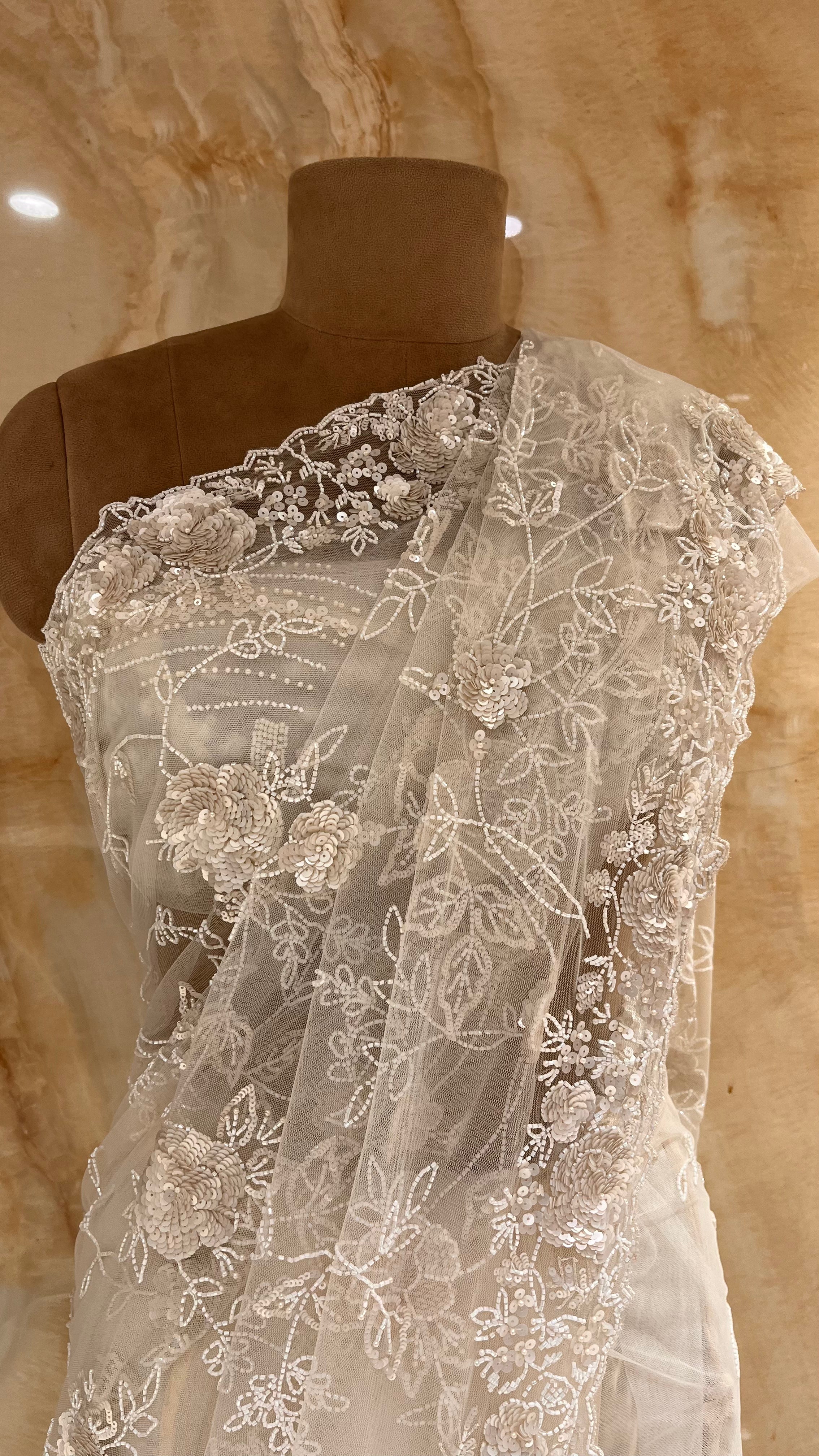 LUXURY OFF-WHITE HEAVY EMBROIDERED NET SAREE