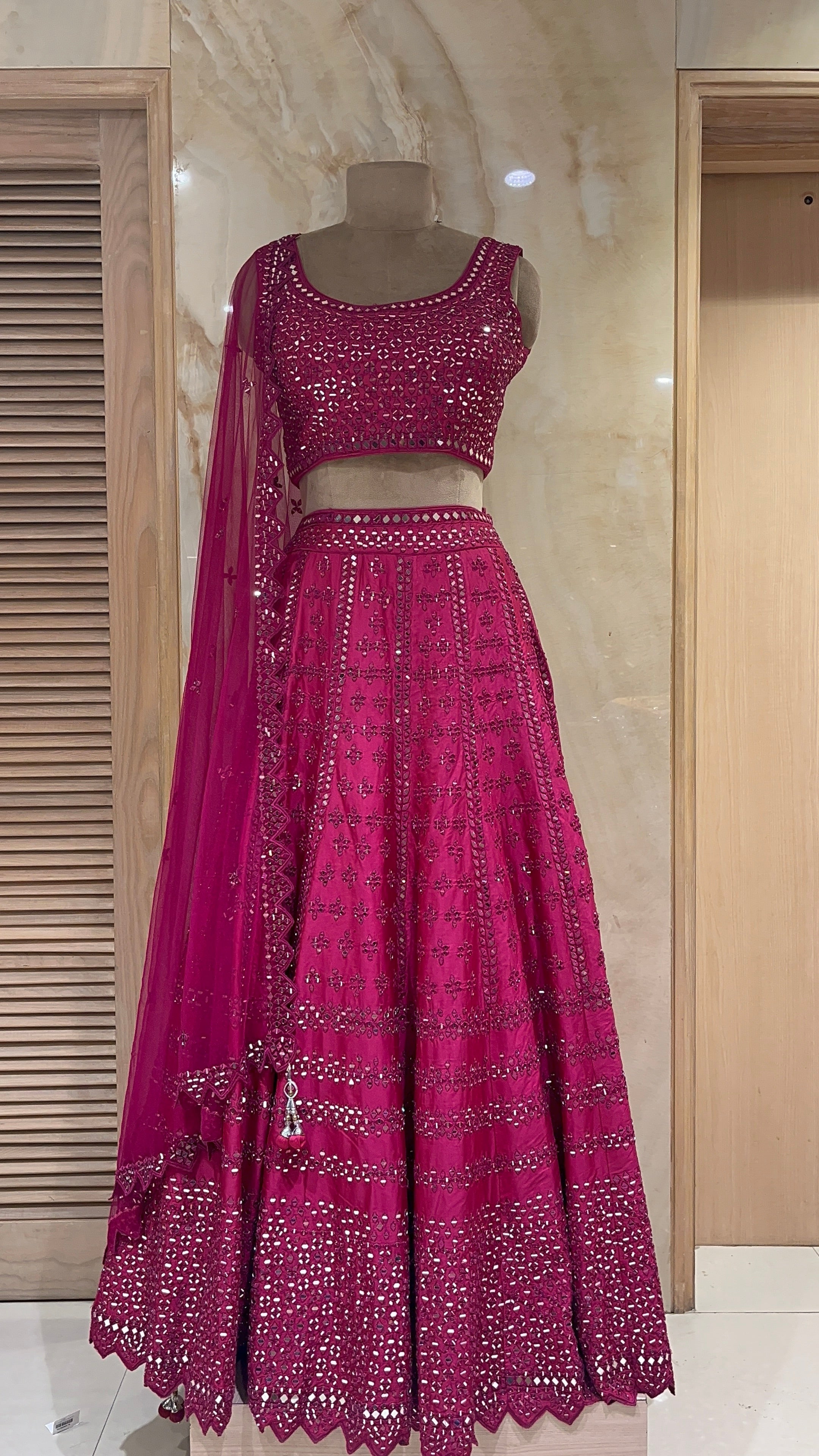 STUNNING MAGENTA DESIGNER LEHENGA WITH MIRROR & EMBROIDERY WORK