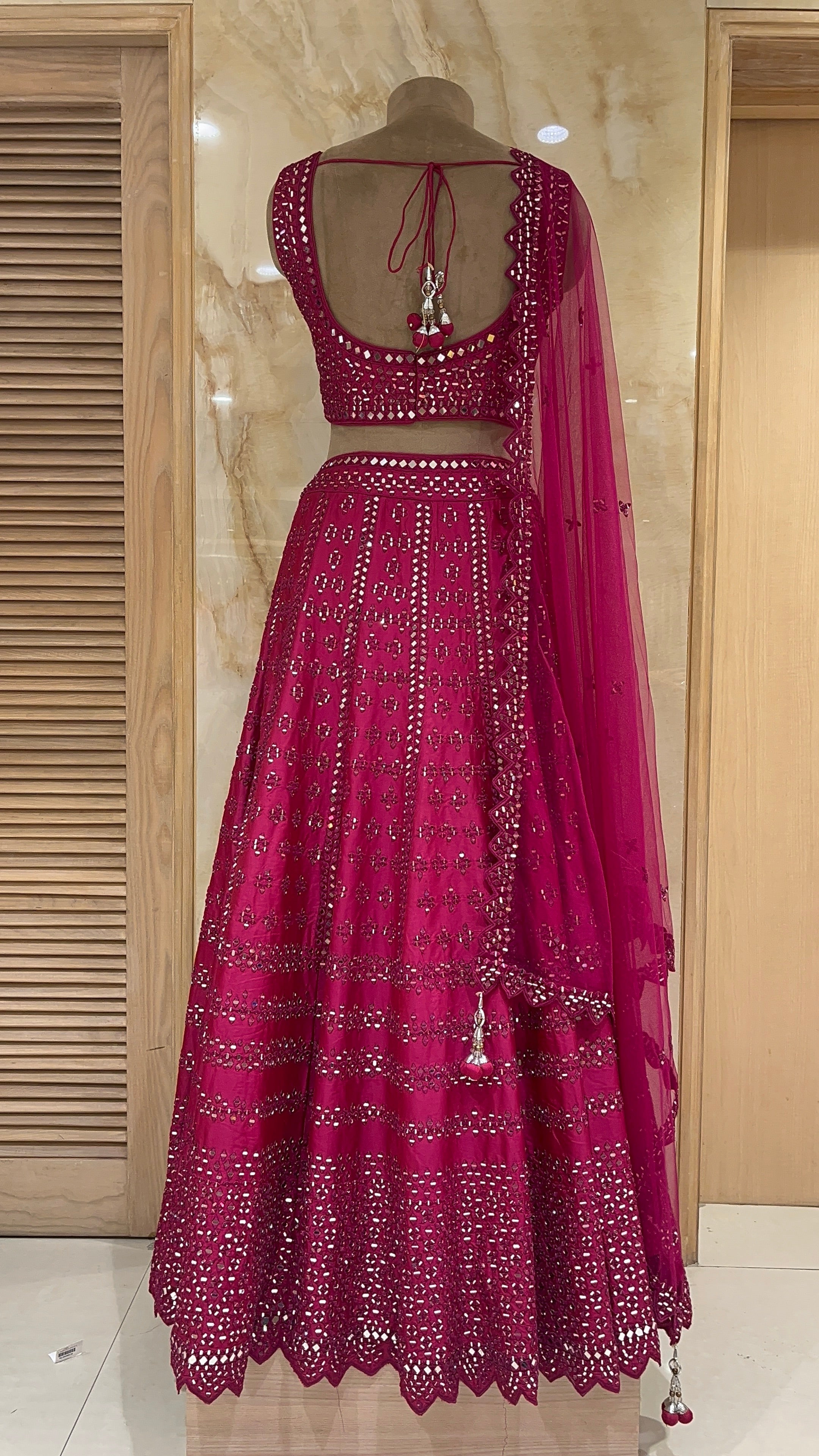 STUNNING MAGENTA DESIGNER LEHENGA WITH MIRROR & EMBROIDERY WORK