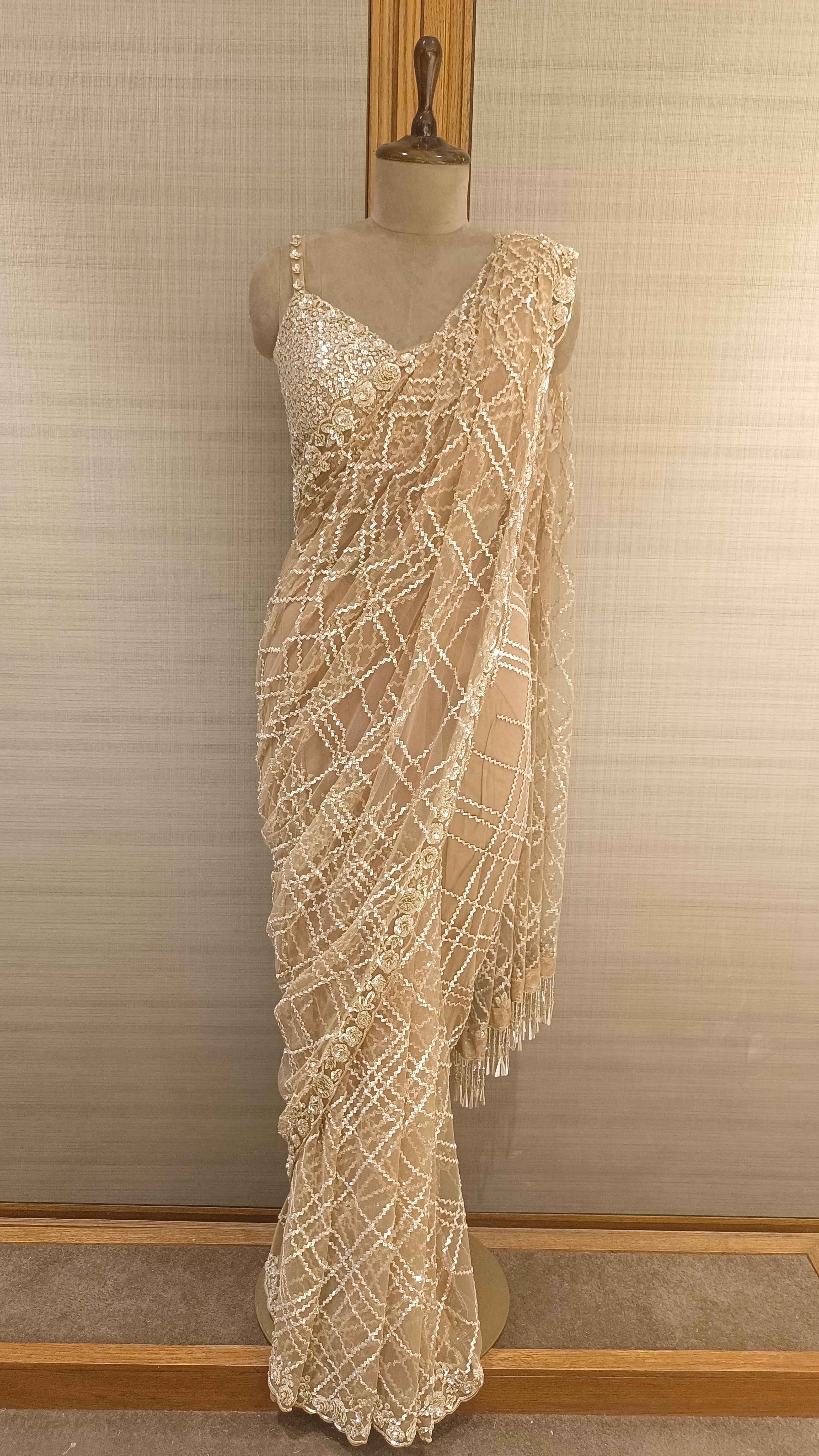 Gold Net Saree with Floral Sequins, Cut Dana, and Beads Embroidery
