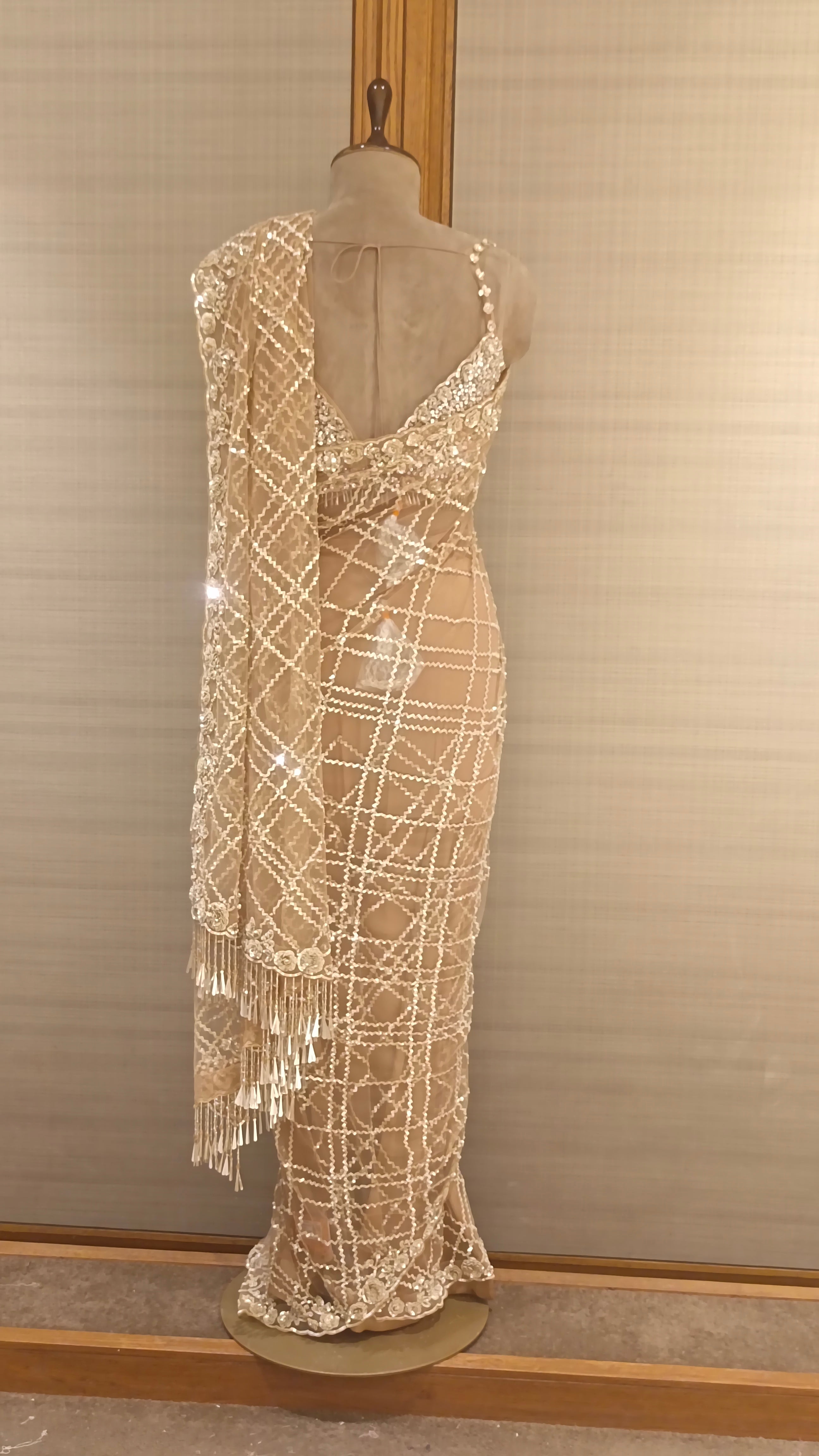 Gold Net Saree with Floral Sequins, Cut Dana, and Beads Embroidery