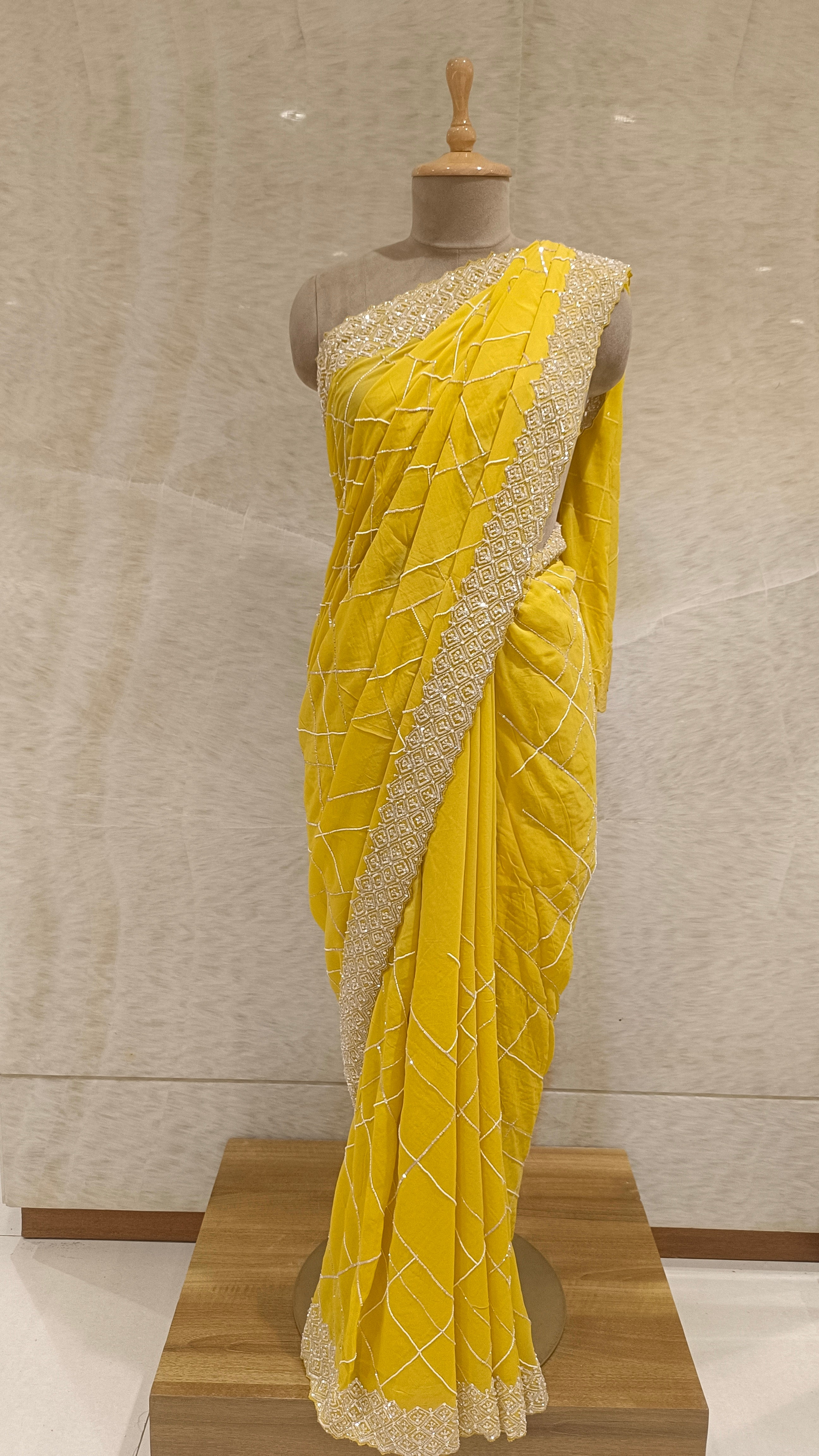 Yellow Georgette Saree with Sequins, Cut Dana, and Pearls Embroidery