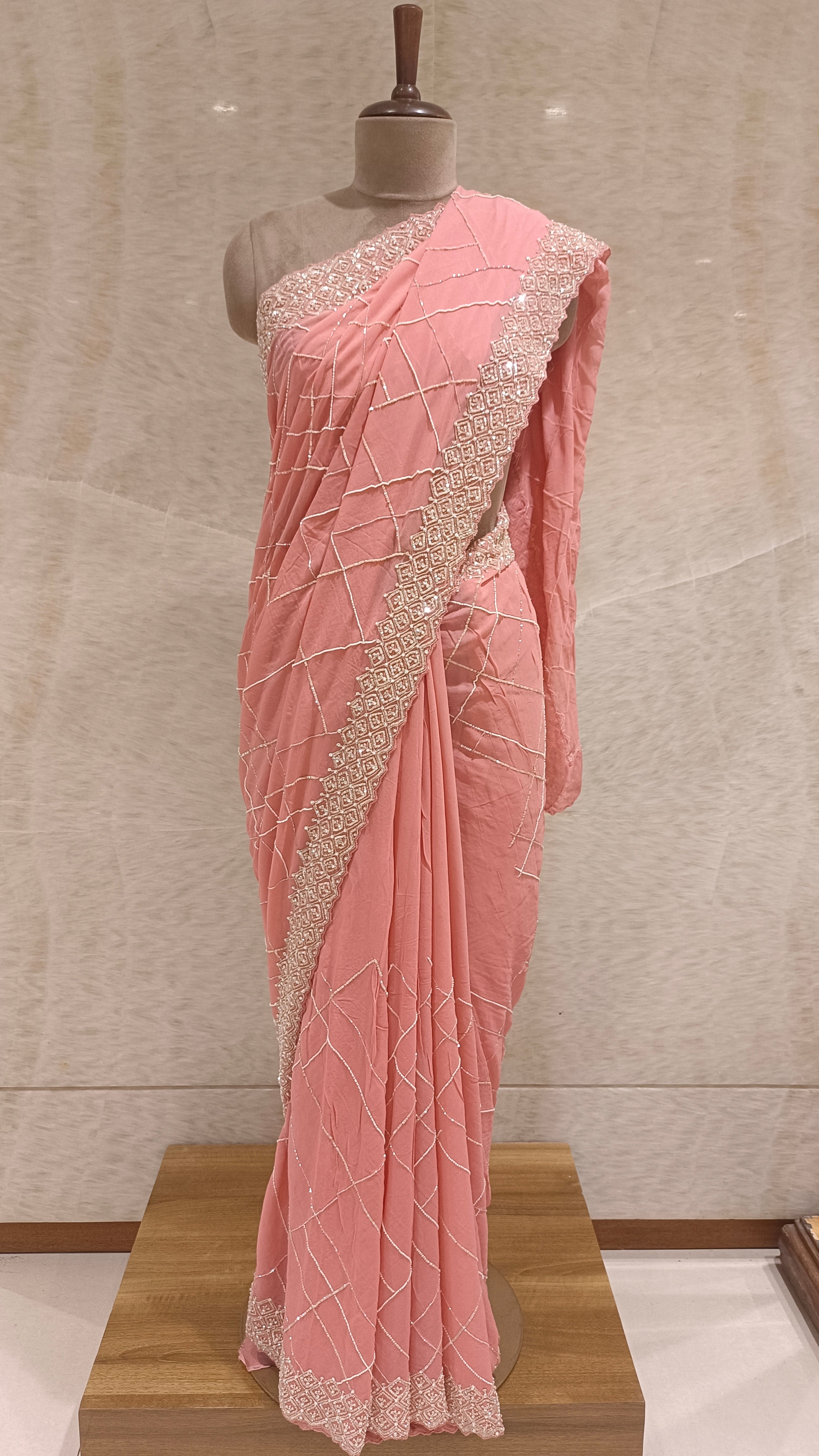 Pink Net Saree with Sequins, Cut Dana, and Sitara Embroidery