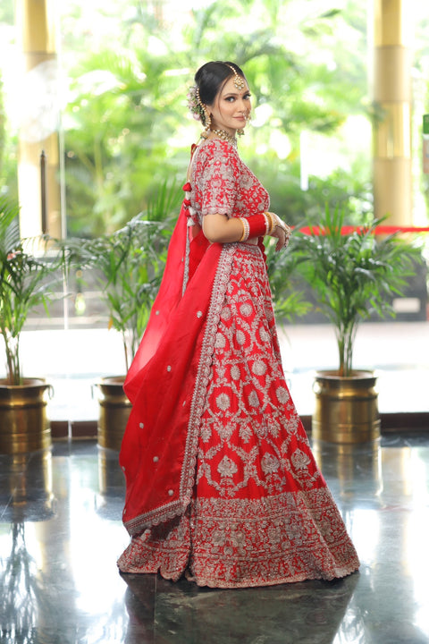 Red Raw Silk Embroidered Floral Sweetheart Cut Dana Work Lehenga Set For Women