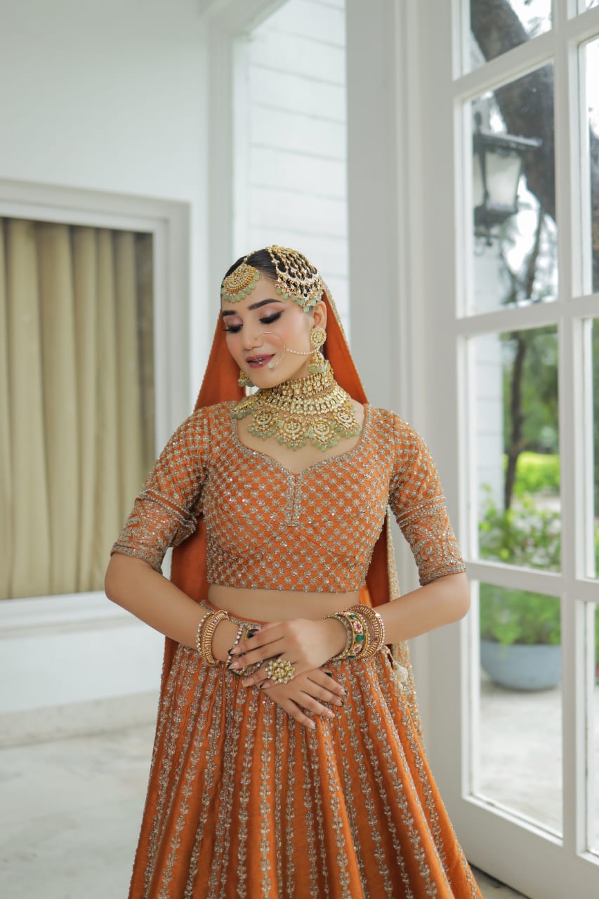 Mustard Orange Raw Silk Embroidery Sequin & Beads Sweetheart Neck Lehenga Set For Women