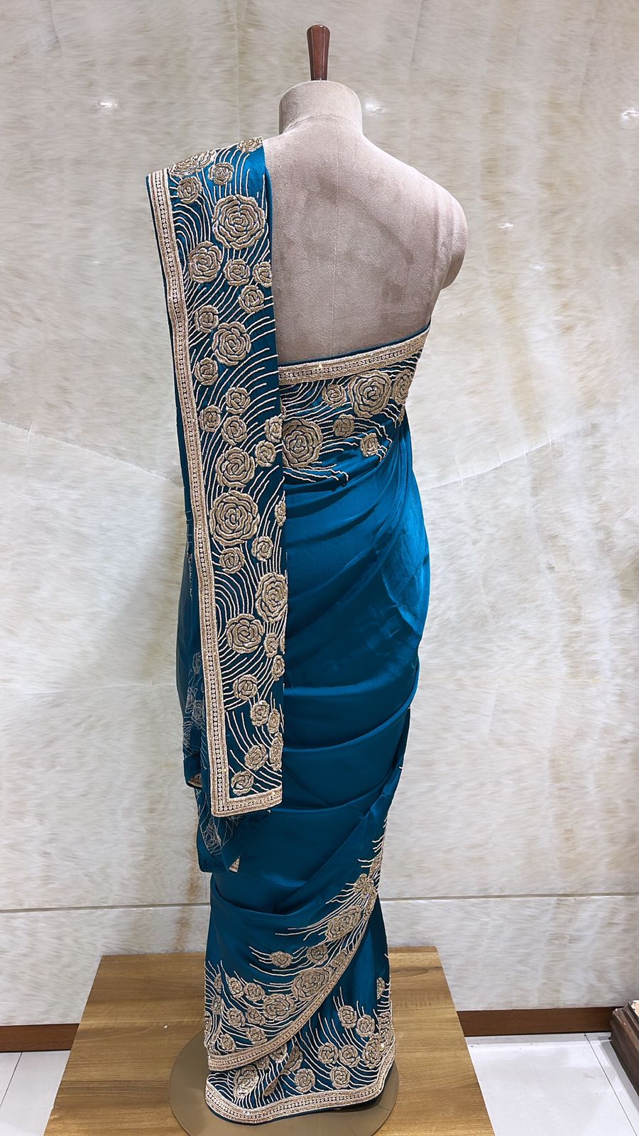 Timeless Elegance: Peacock Satin Saree with Pearls, Tilla, and Beads Embroidery