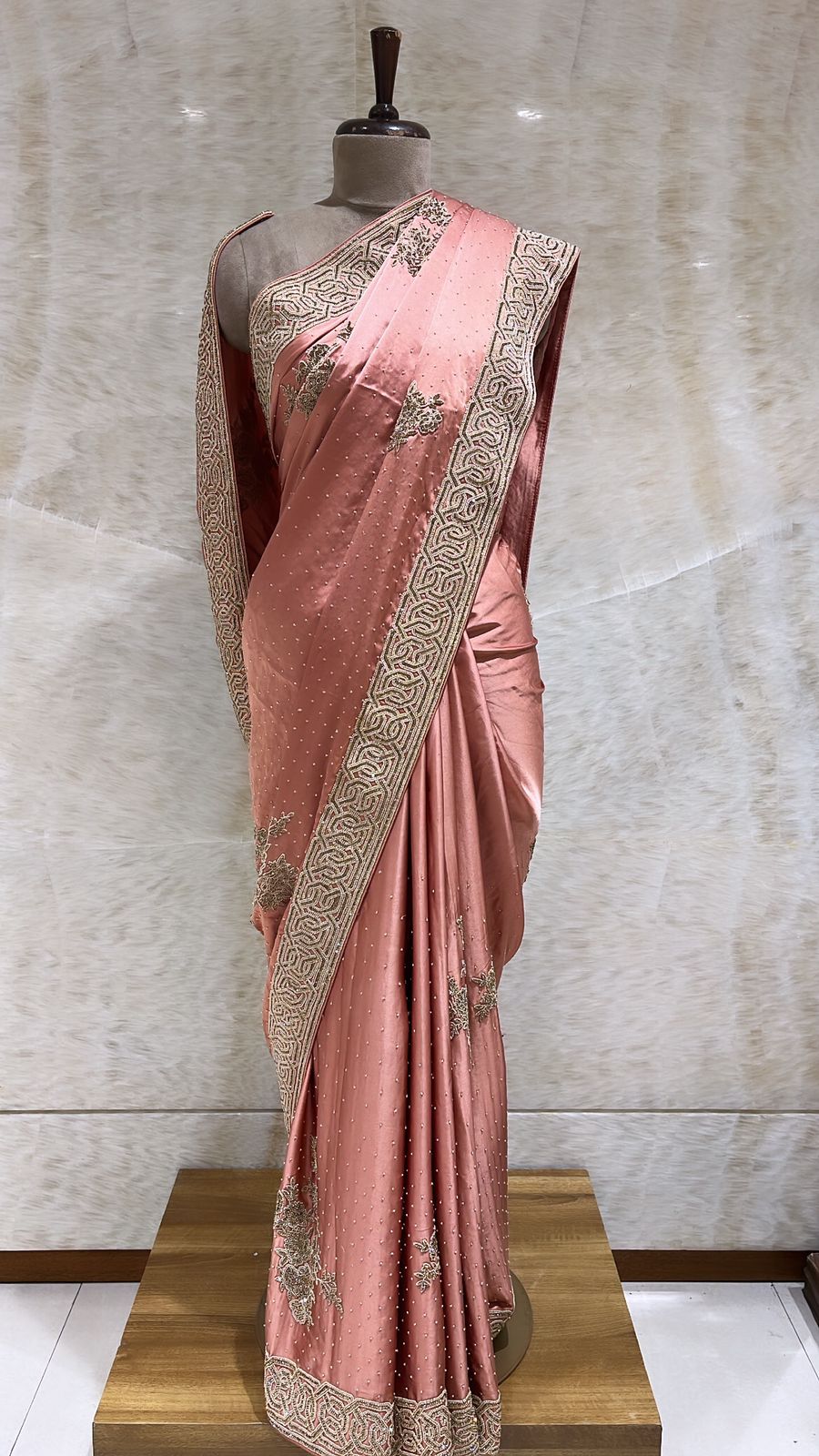 Graceful Peach Satin Saree Embroidered with Pearls, Tilla, and Beads