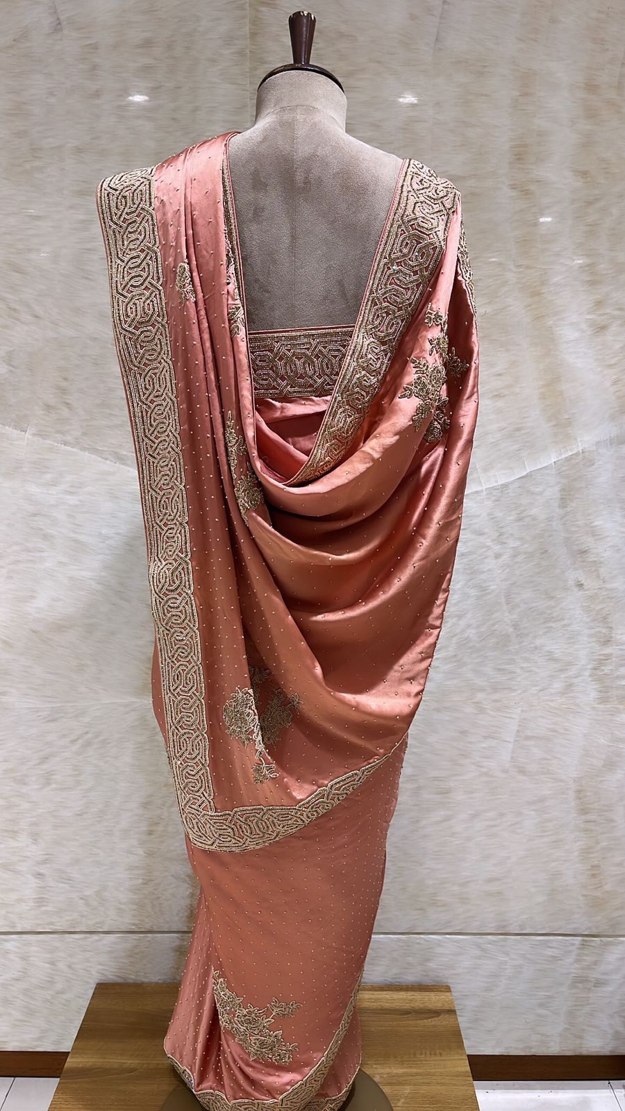 Graceful Peach Satin Saree Embroidered with Pearls, Tilla, and Beads