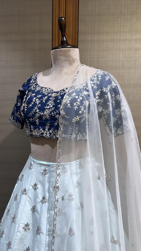 Sapphire Dreams: A Dusty Sky Blue Lehenga with Sapphire Blue Choli