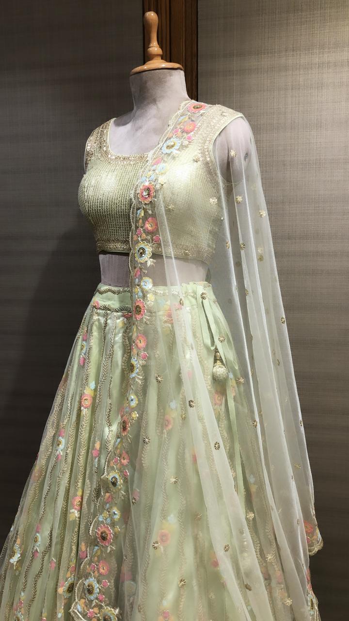 Floral Elegance: Lehenga Choli Adorned with Enchanting Motifs
