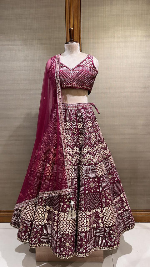 Regal Splendor: Plum Bridal Lehenga with Thread, Stones, and Tilla Embellishments