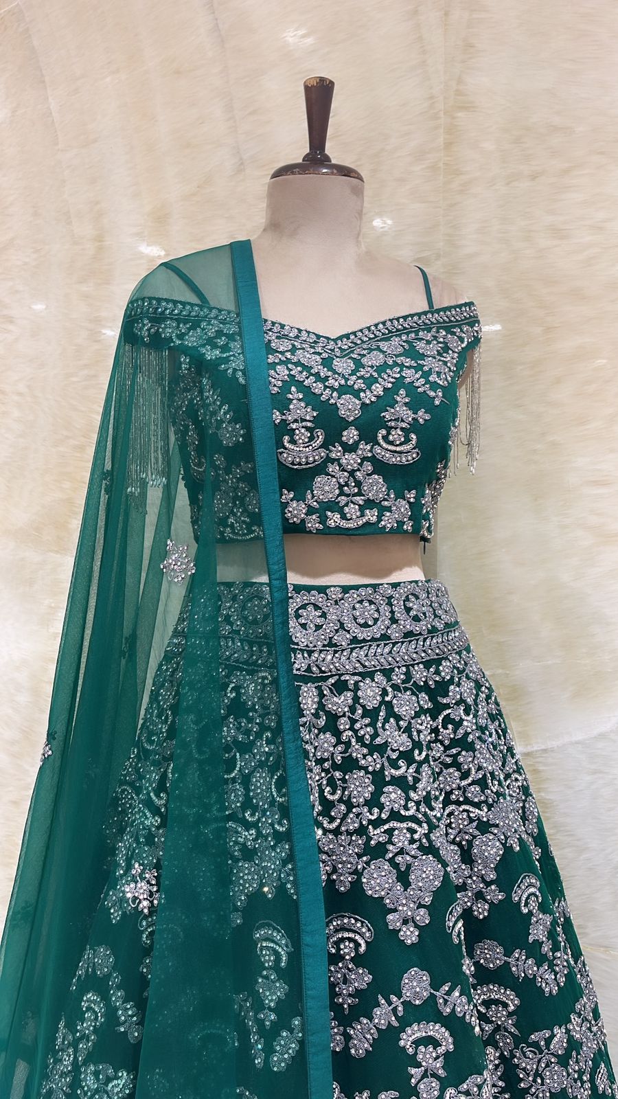 Bottle Green Lehenga Choli: Exquisite Embellishments of Dori, Stones, and Tassels