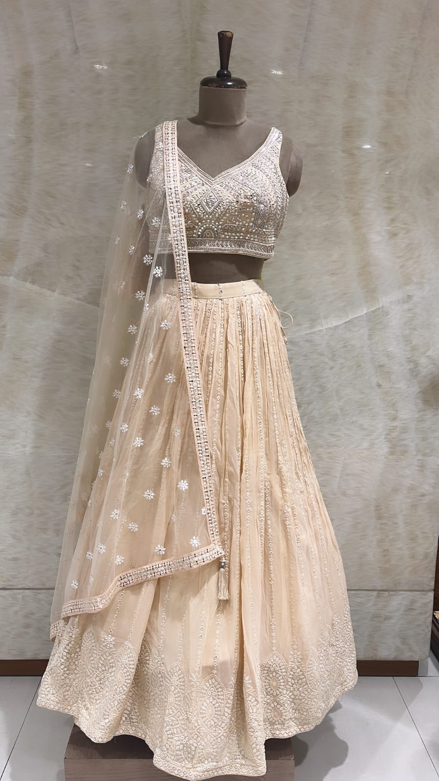 Timeless Ivory: Cream Mirror Work Net Readymade Lehenga