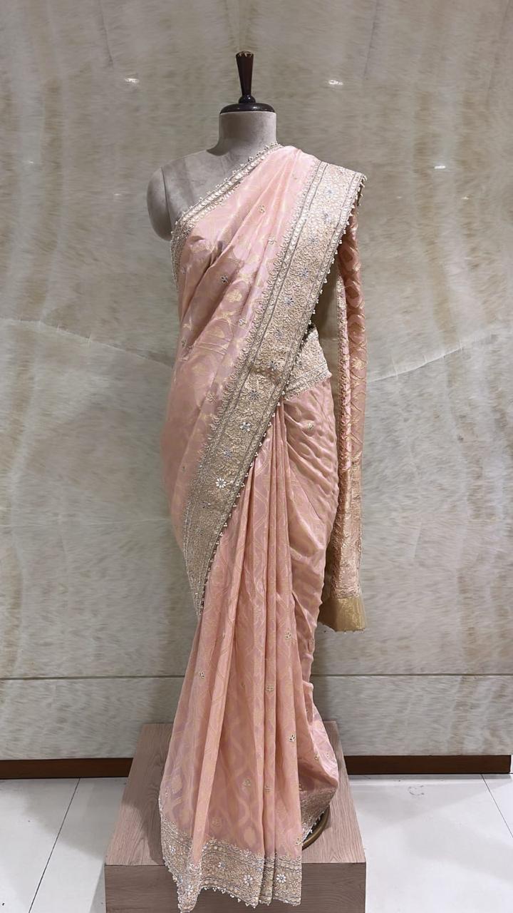 Elegant Peach Banarasi Saree: Mirror Work, Stones, Pearls, and Tilla Embroidery