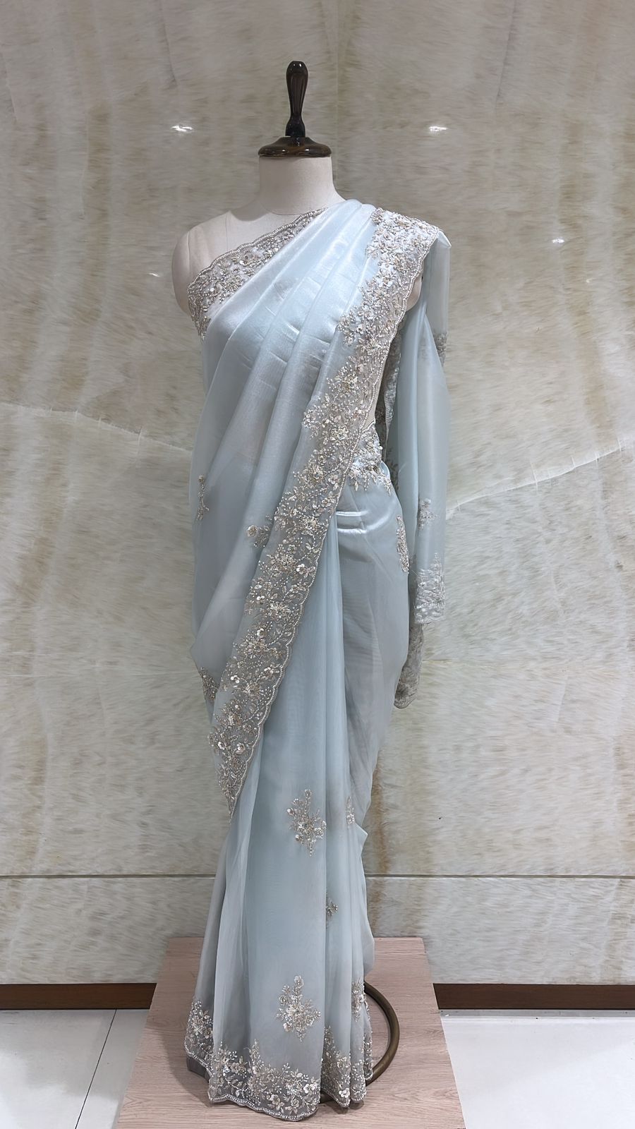 Love-in-Blue Organza Saree: Sky Blue and Floral Motifs with Elegant Embroidery
