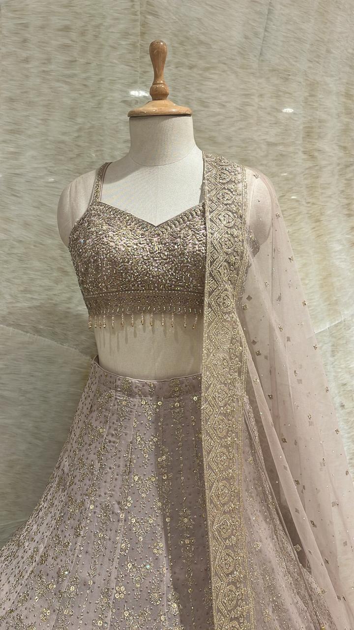 Subtle Sparkle: Dusty Peach Sequins Work Net Readymade Lehenga