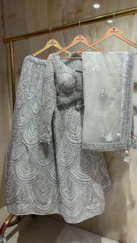 Sparkling Silver Grey Readymade Lehnga Choli Set Paired With Matching Organza Dupatta.