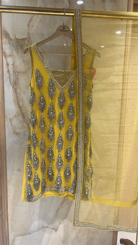 Vibrant Mustard Yellow Readymade Suit Paired With Matching Bottom & Net Dupatta.