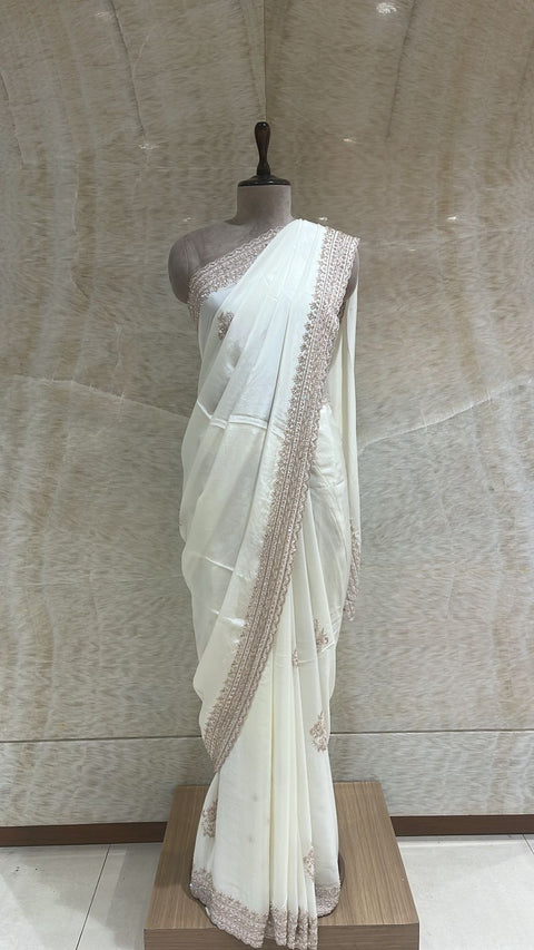 Adorable Vanilla White Saree Paired With Unstitched Blouse