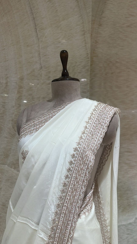 Adorable Vanilla White Saree Paired With Unstitched Blouse