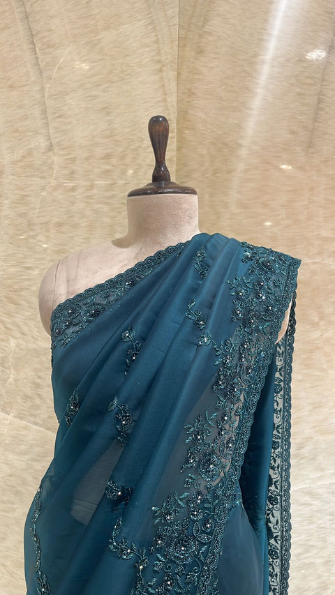 Intricate Sequins, Beads & Sippi Embroidered Peacock Blue Organza Saree