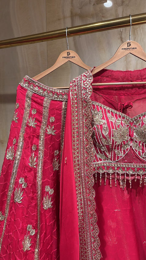 Vibrant Fuchsia Readymade Lehnga Set Paired With Matching Jacket.