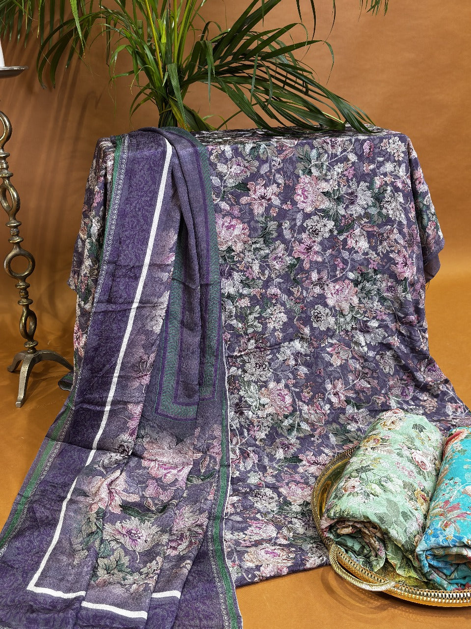 Elegant purple floral embroided fabric with threadwork