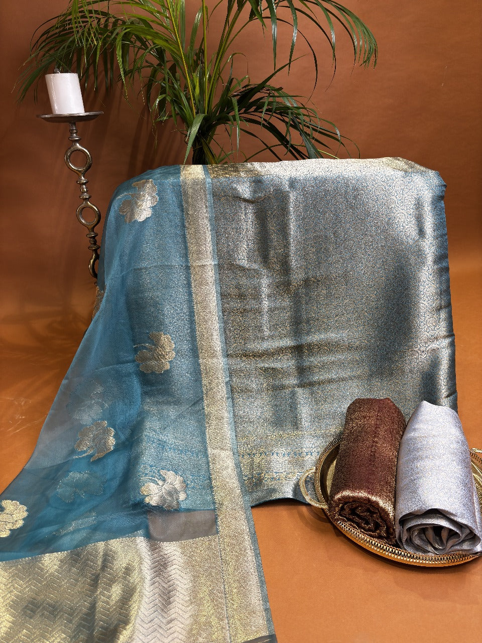 Teal silk fabric with golden zari & geometric weaving