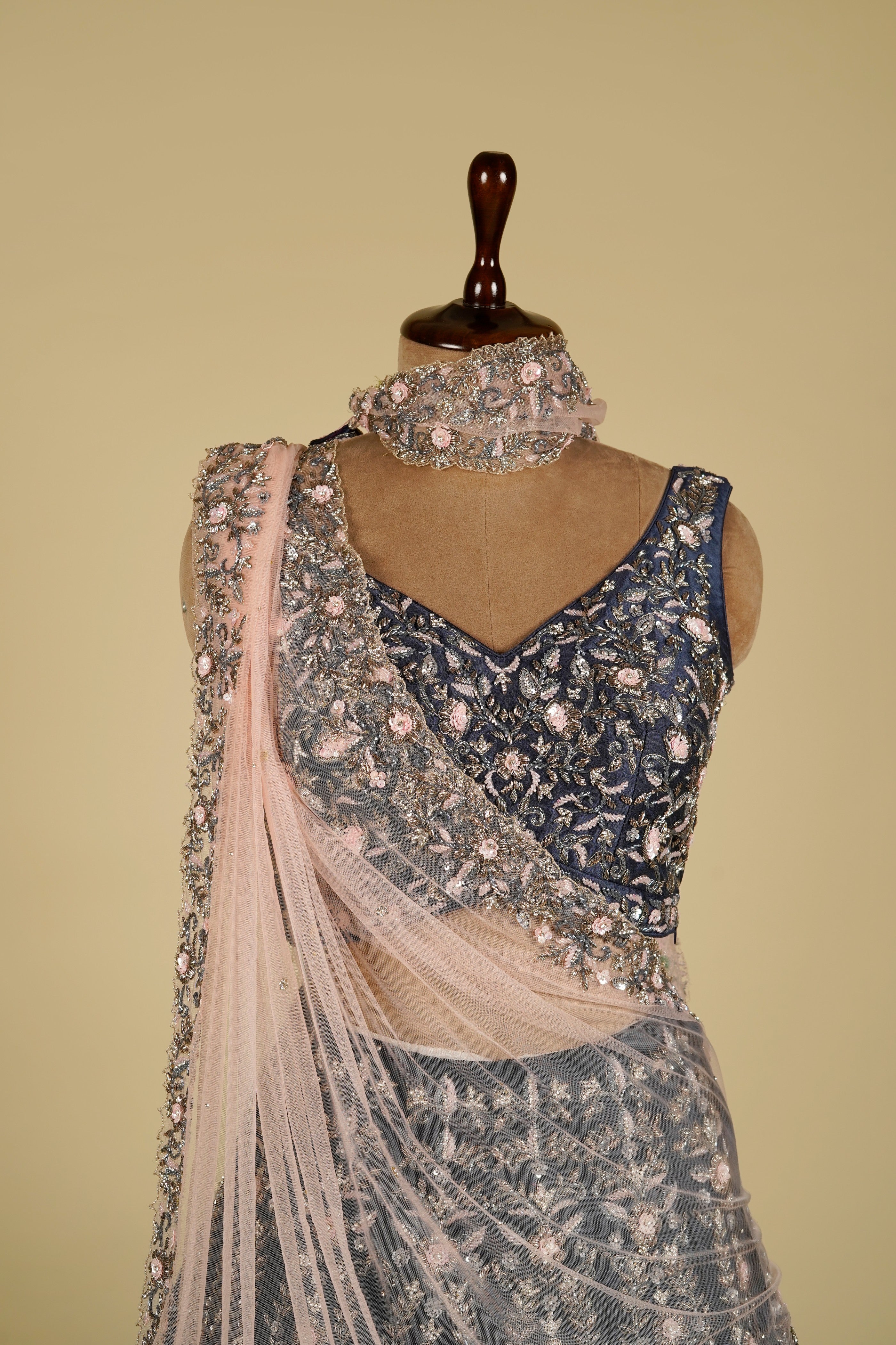 Lehenga Choli embellished with Sequin, Cut dana and Naqshi work