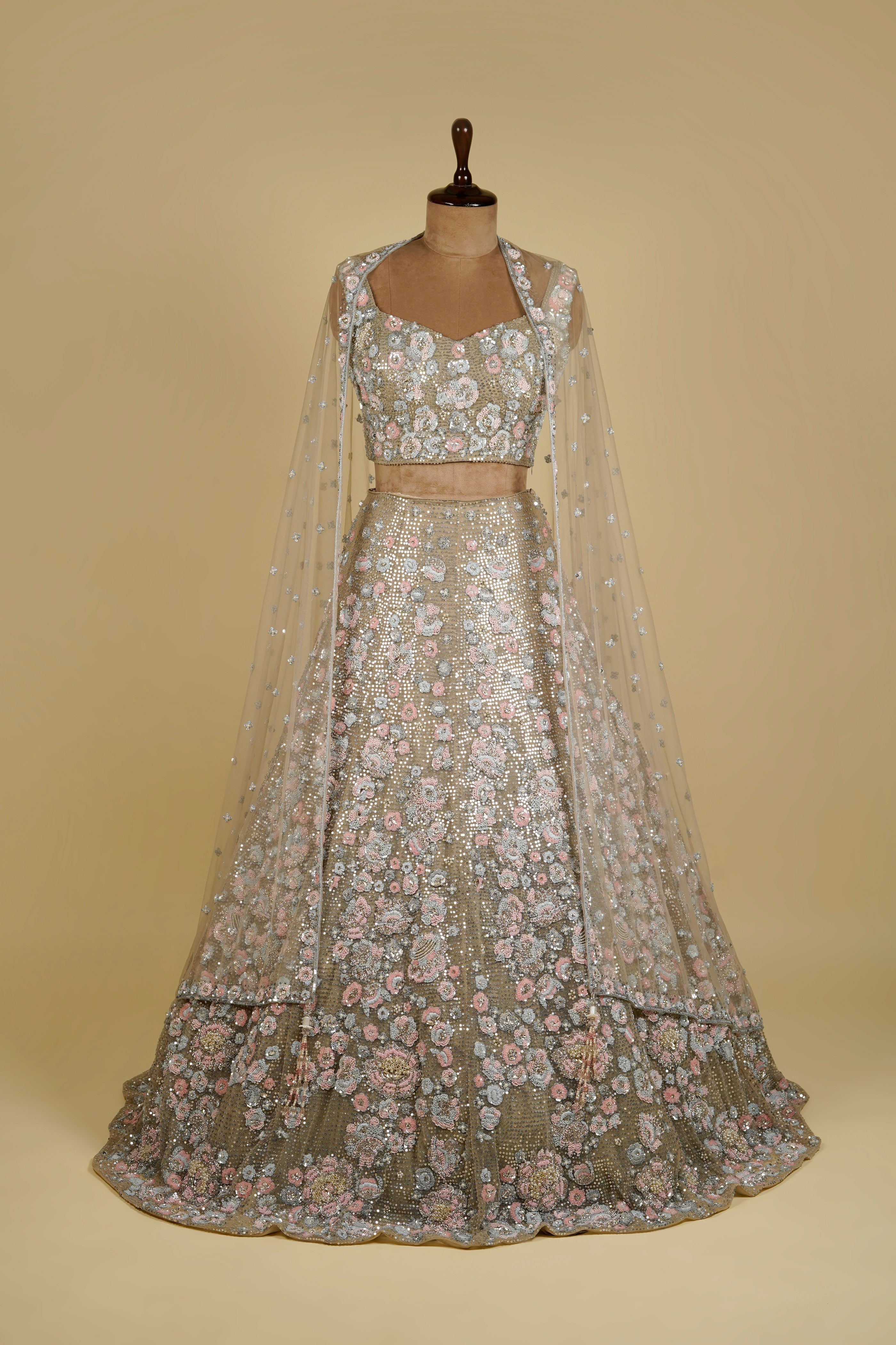 Light olive green Lehenga Choli embellished with Floral Motifs