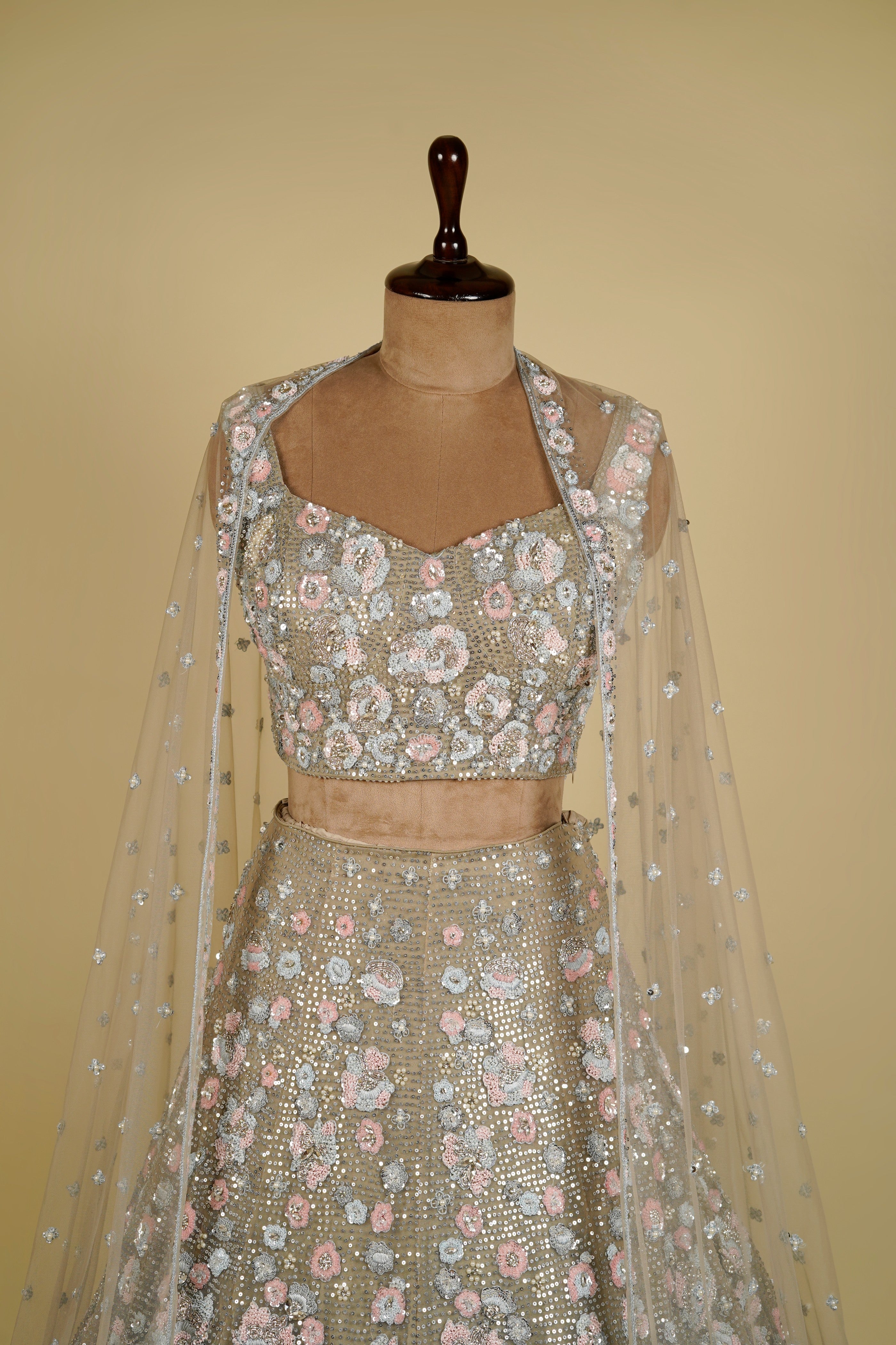 Light olive green Lehenga Choli embellished with Floral Motifs