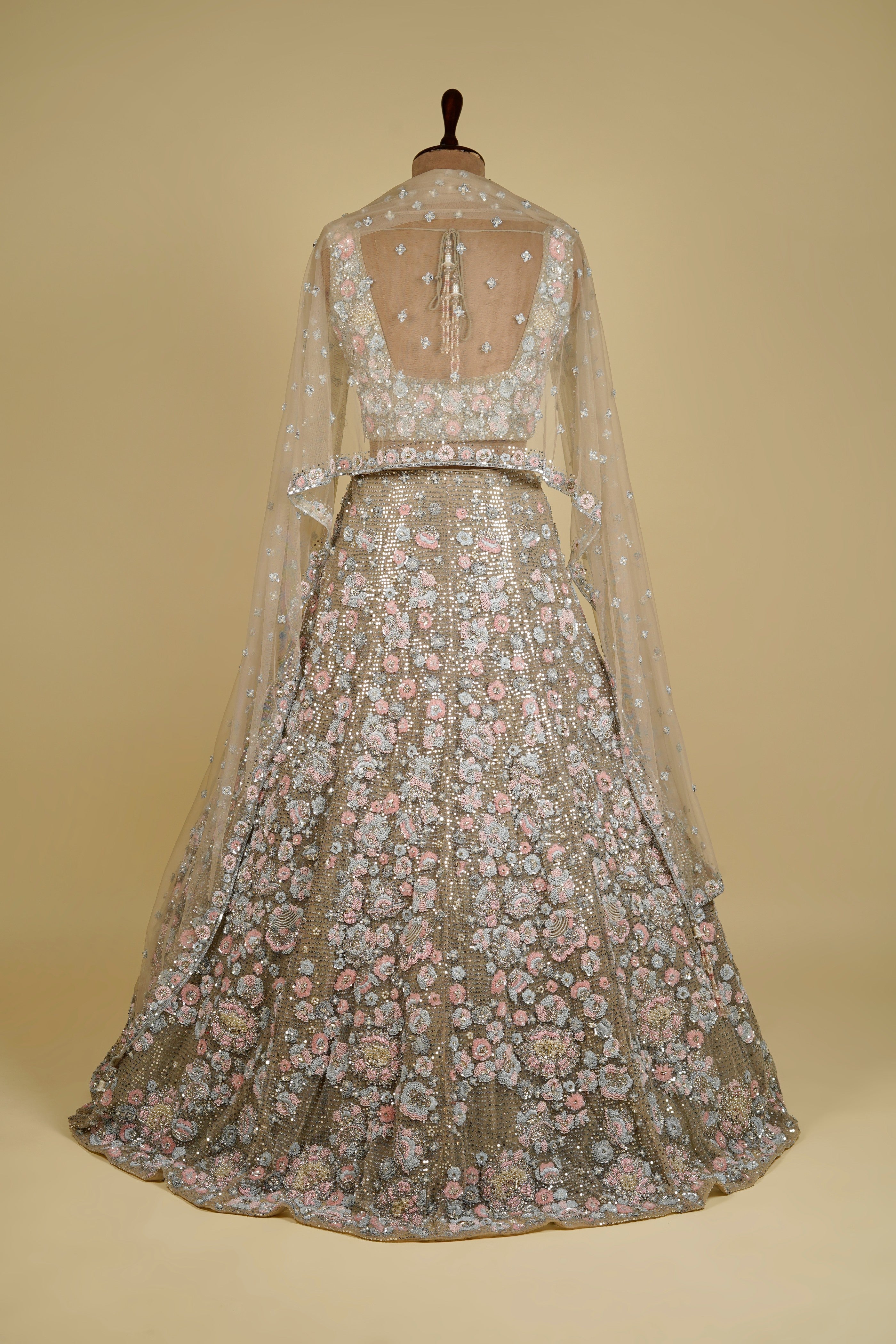 Light olive green Lehenga Choli embellished with Floral Motifs