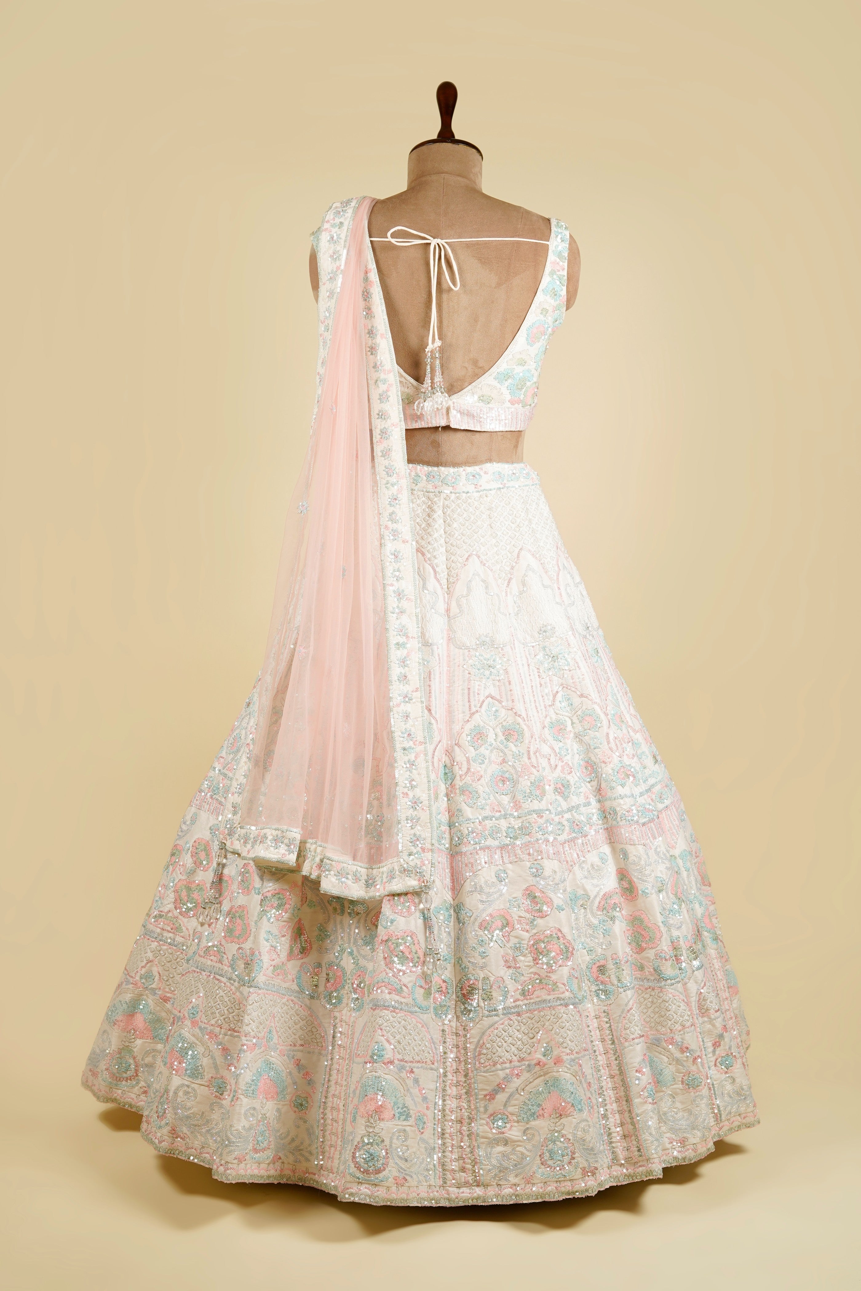 Off White Lehenga Choli Embellished with Sequins and Cut Dana Work