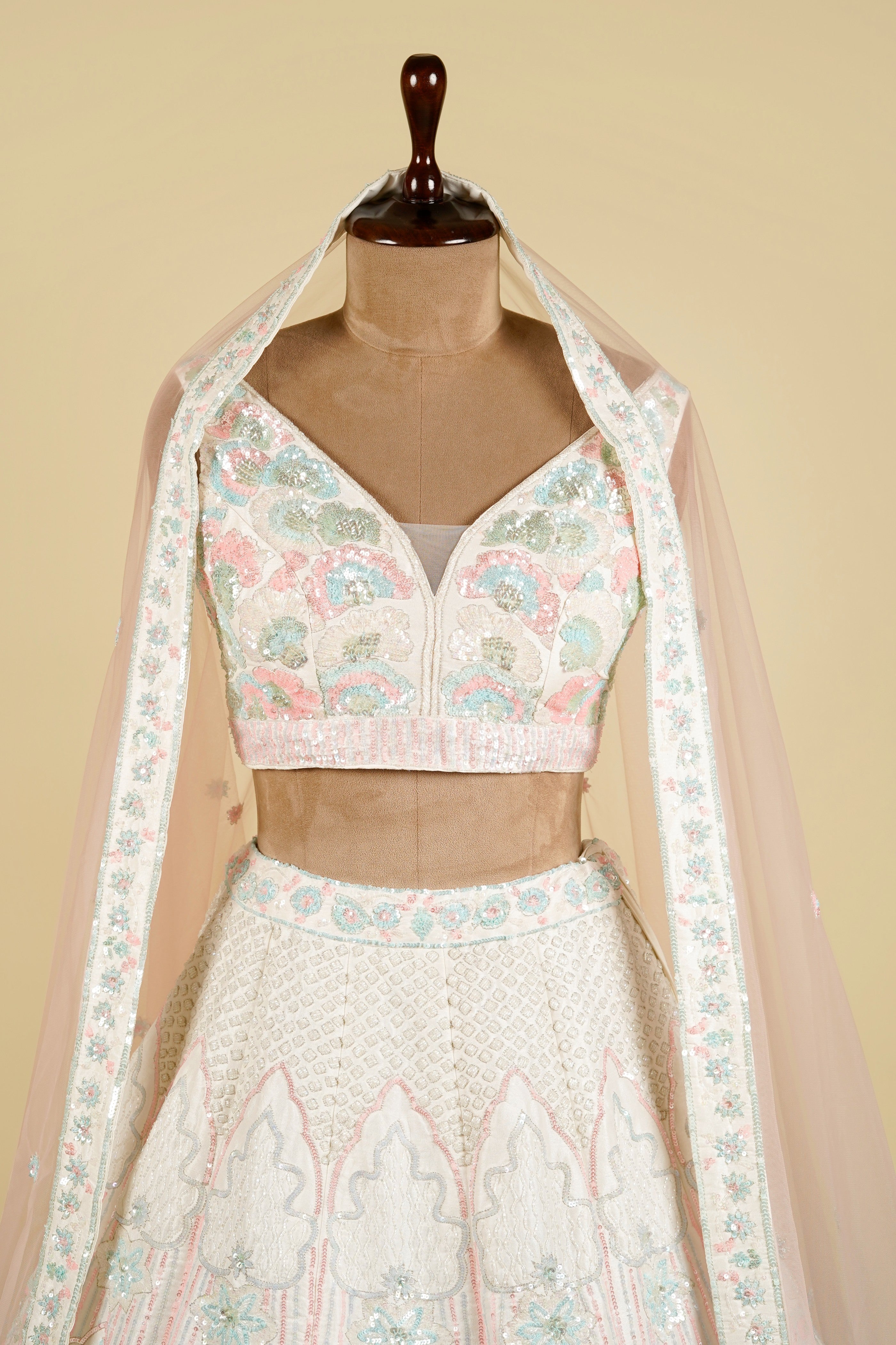 Off White Lehenga Choli Embellished with Sequins and Cut Dana Work