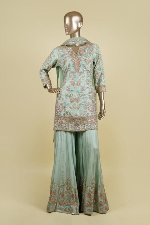 Light Frozi Sharara set embellished with Zari, Thread and Sequin work