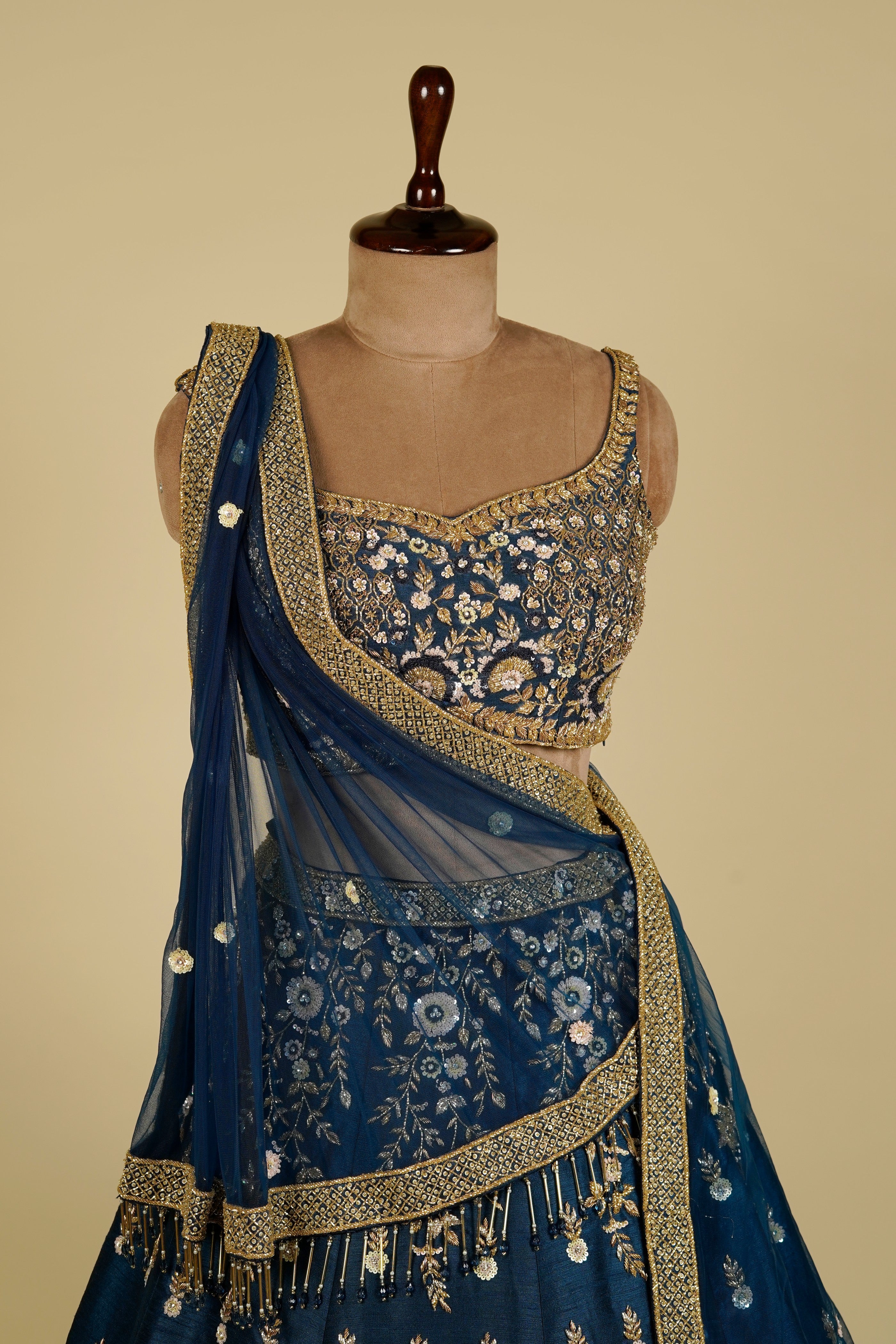 Lehenga Choli embellished with Sequin, Cut dana and Naqshi work