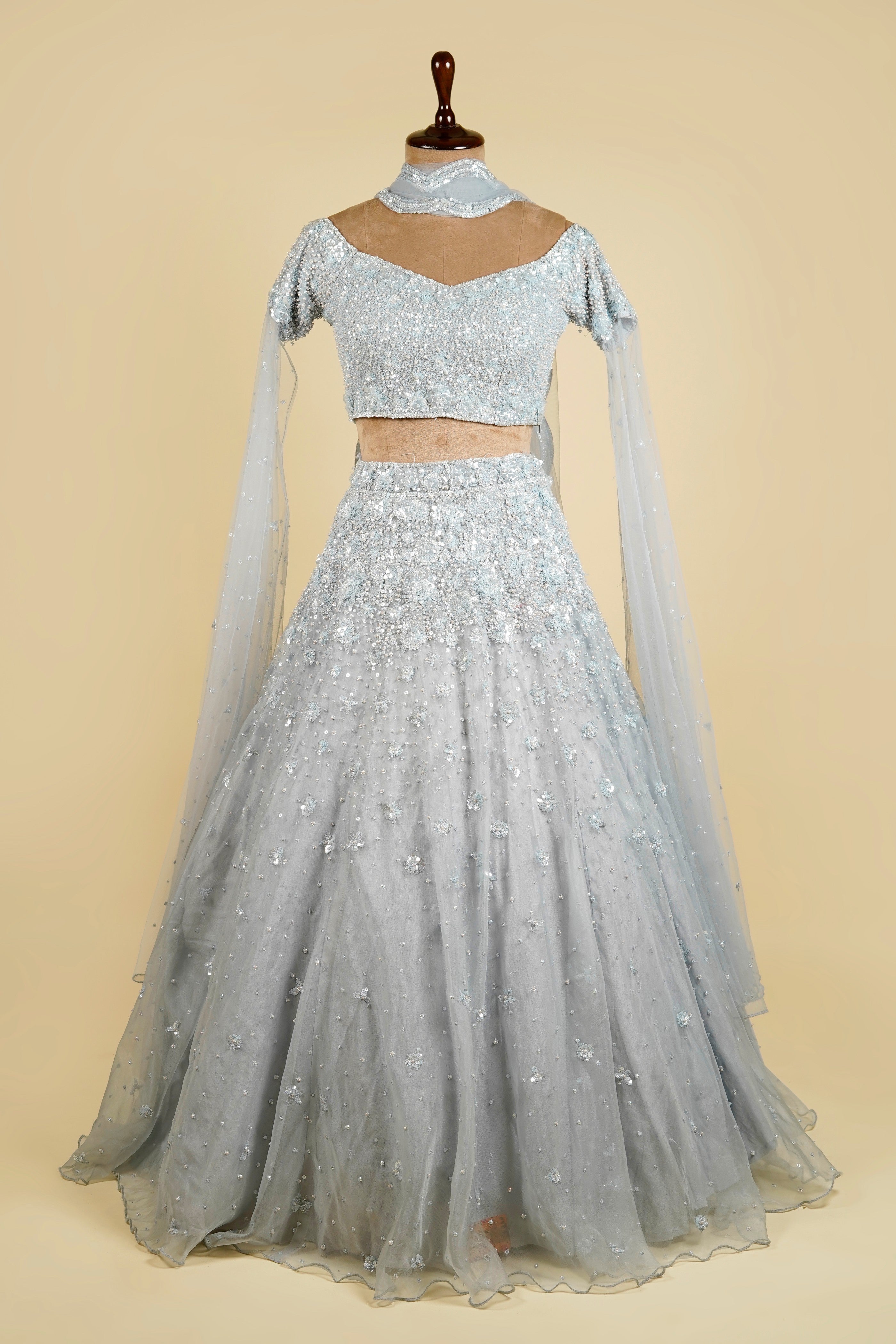 Cape Sleeve Lehenga Choli embellished with Sequin and Bead work