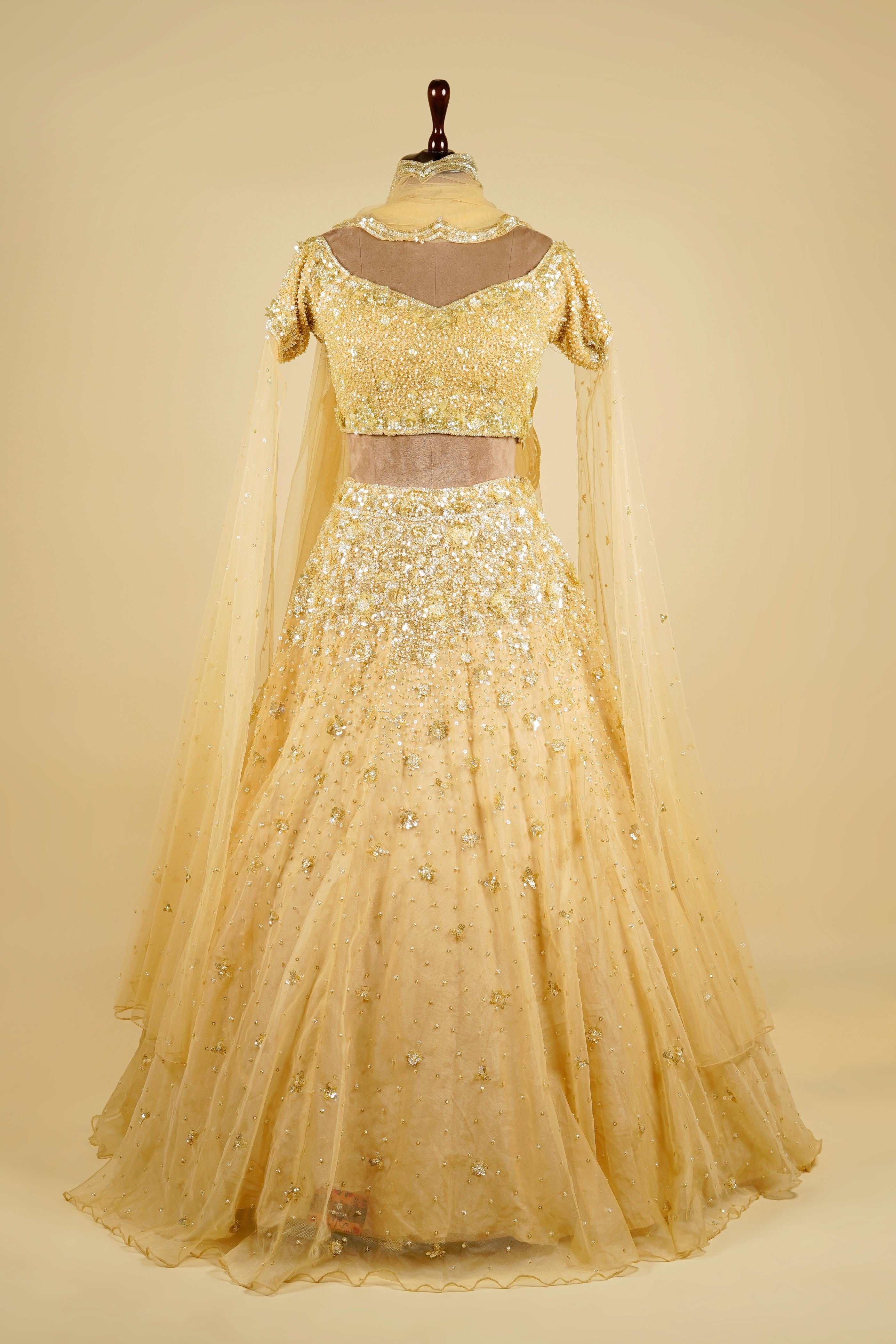 Cape Sleeve Lehenga Choli embellished with Sequin and Bead work