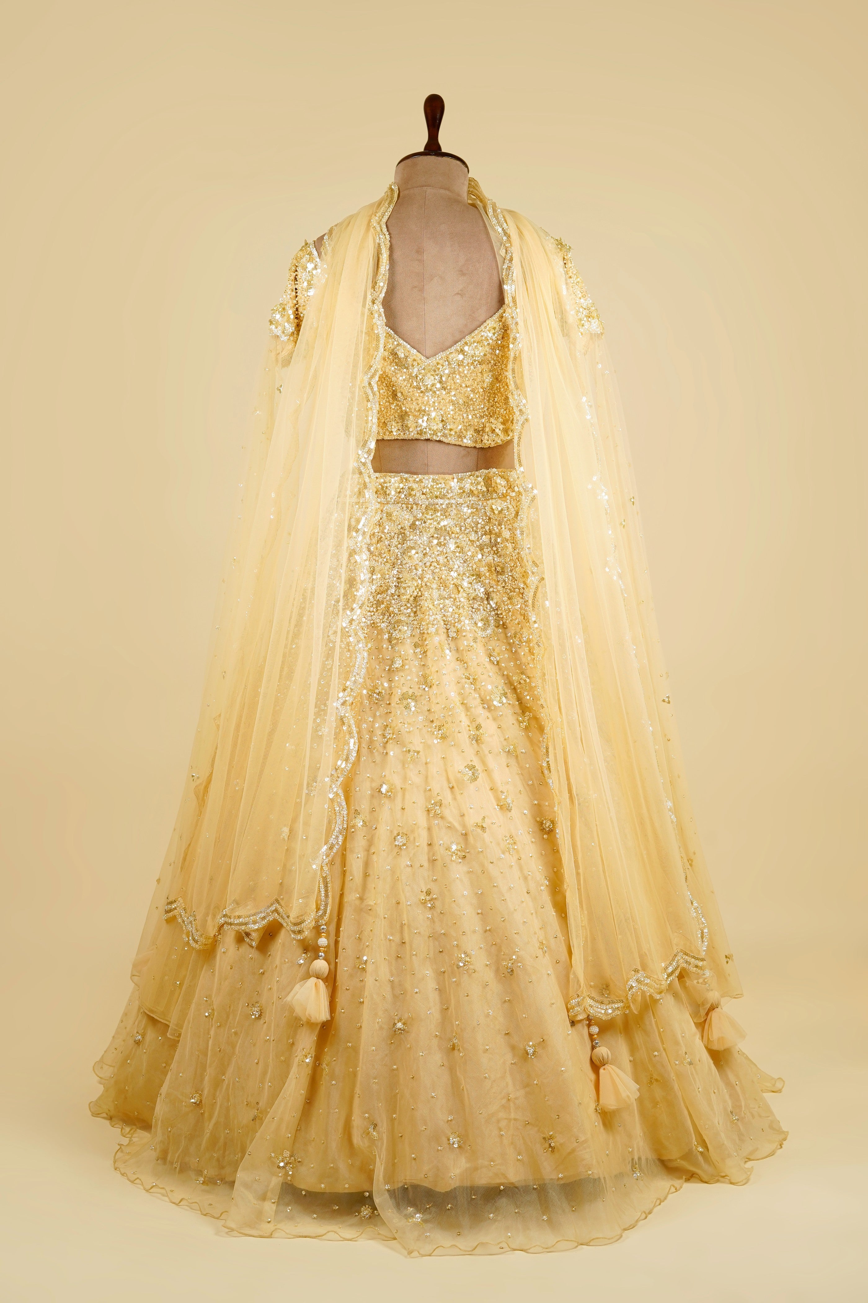 Cape Sleeve Lehenga Choli embellished with Sequin and Bead work