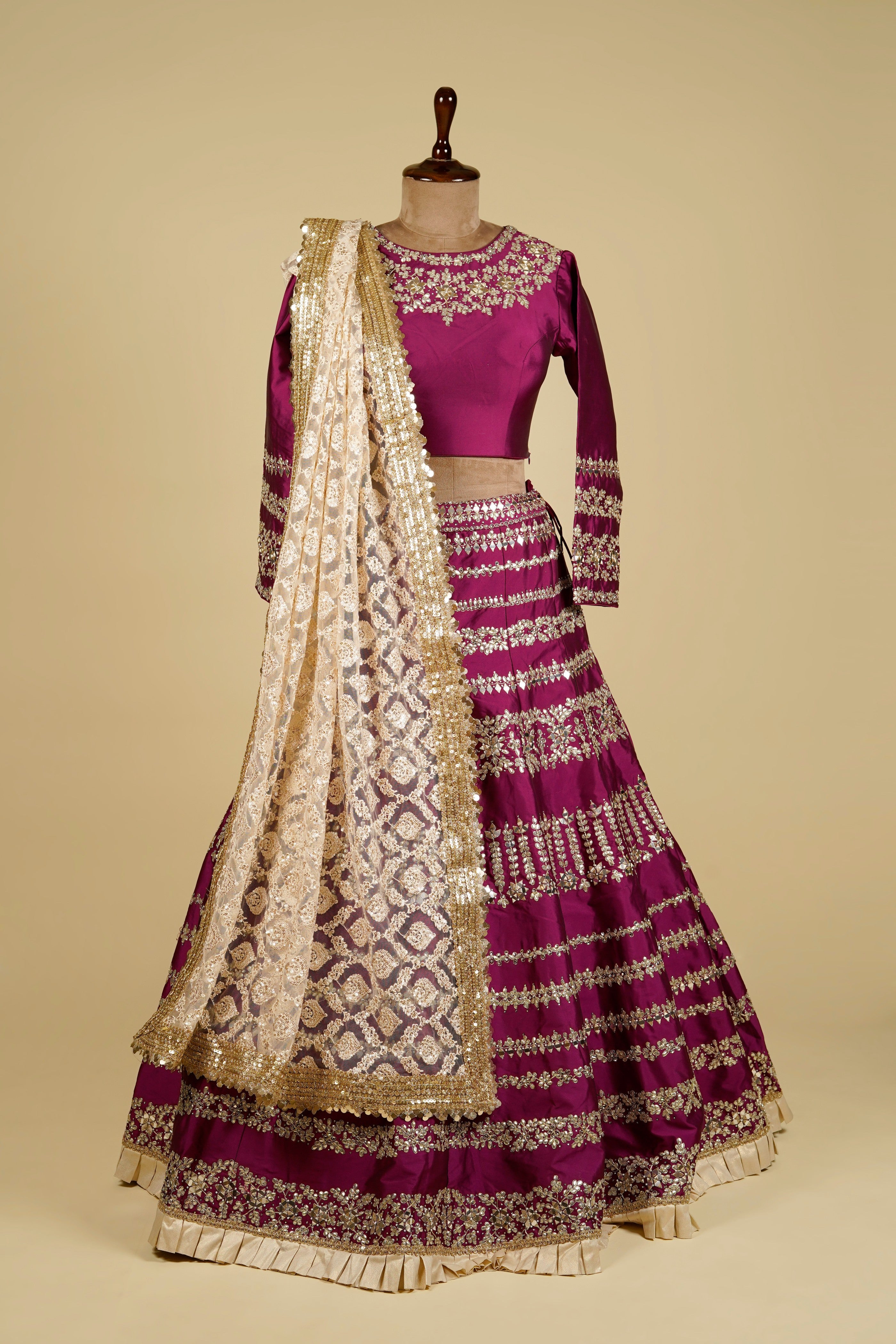 Lehenga Choli embellished with Gota patti, Mirror and Swarovski work