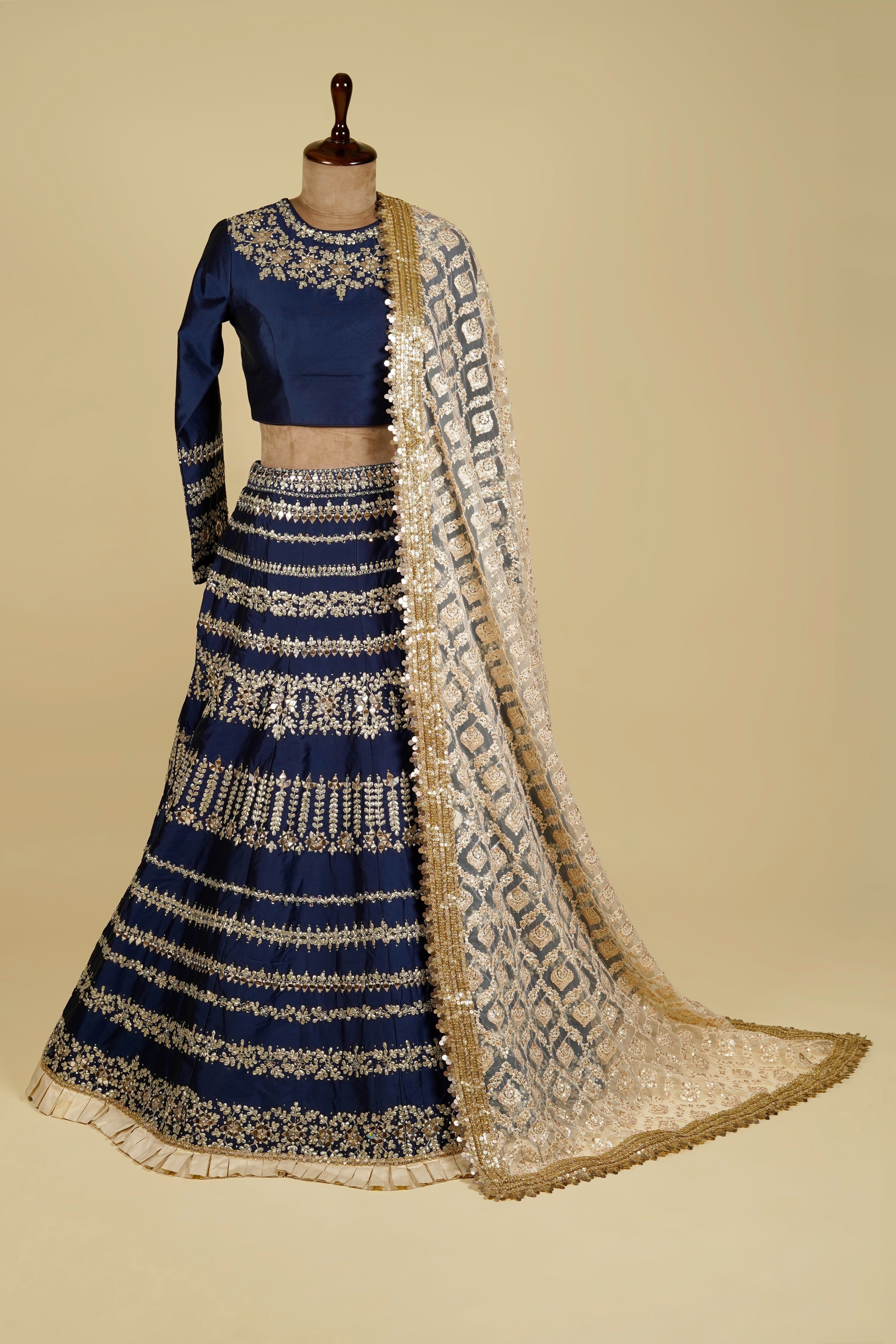 Lehenga Choli embellished with Gota patti, Mirror and Swarovski work