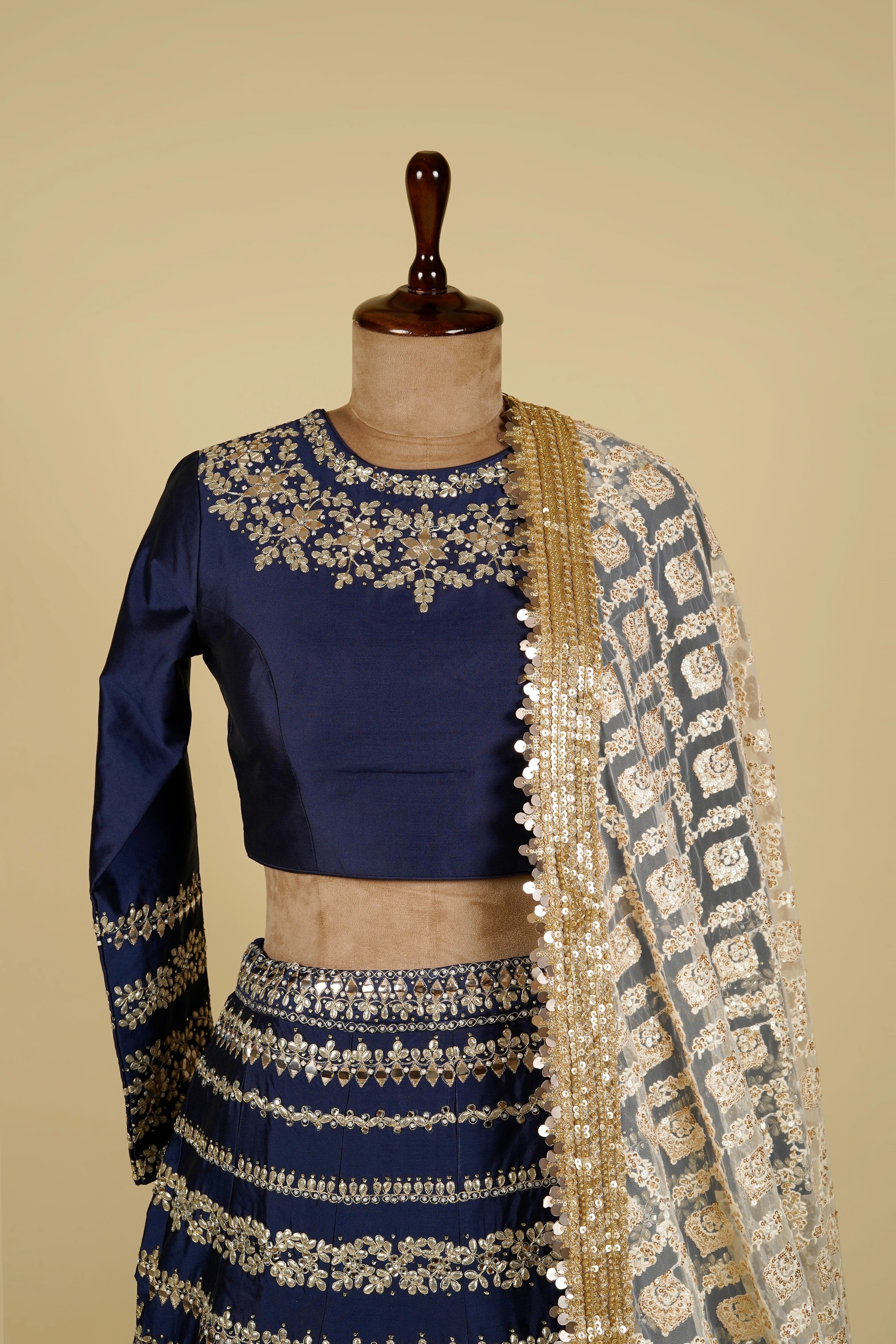 Lehenga Choli embellished with Gota patti, Mirror and Swarovski work