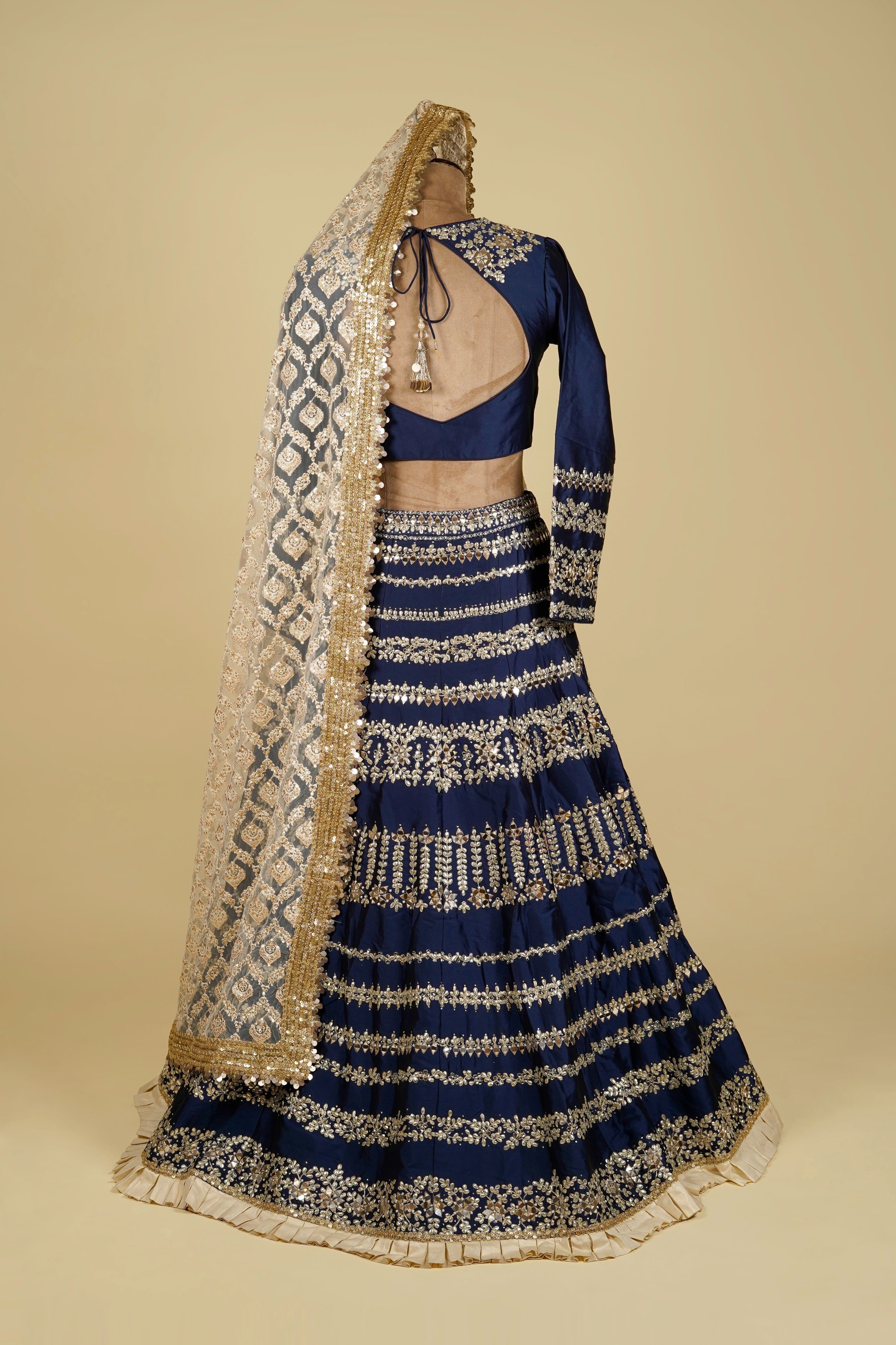 Lehenga Choli embellished with Gota patti, Mirror and Swarovski work