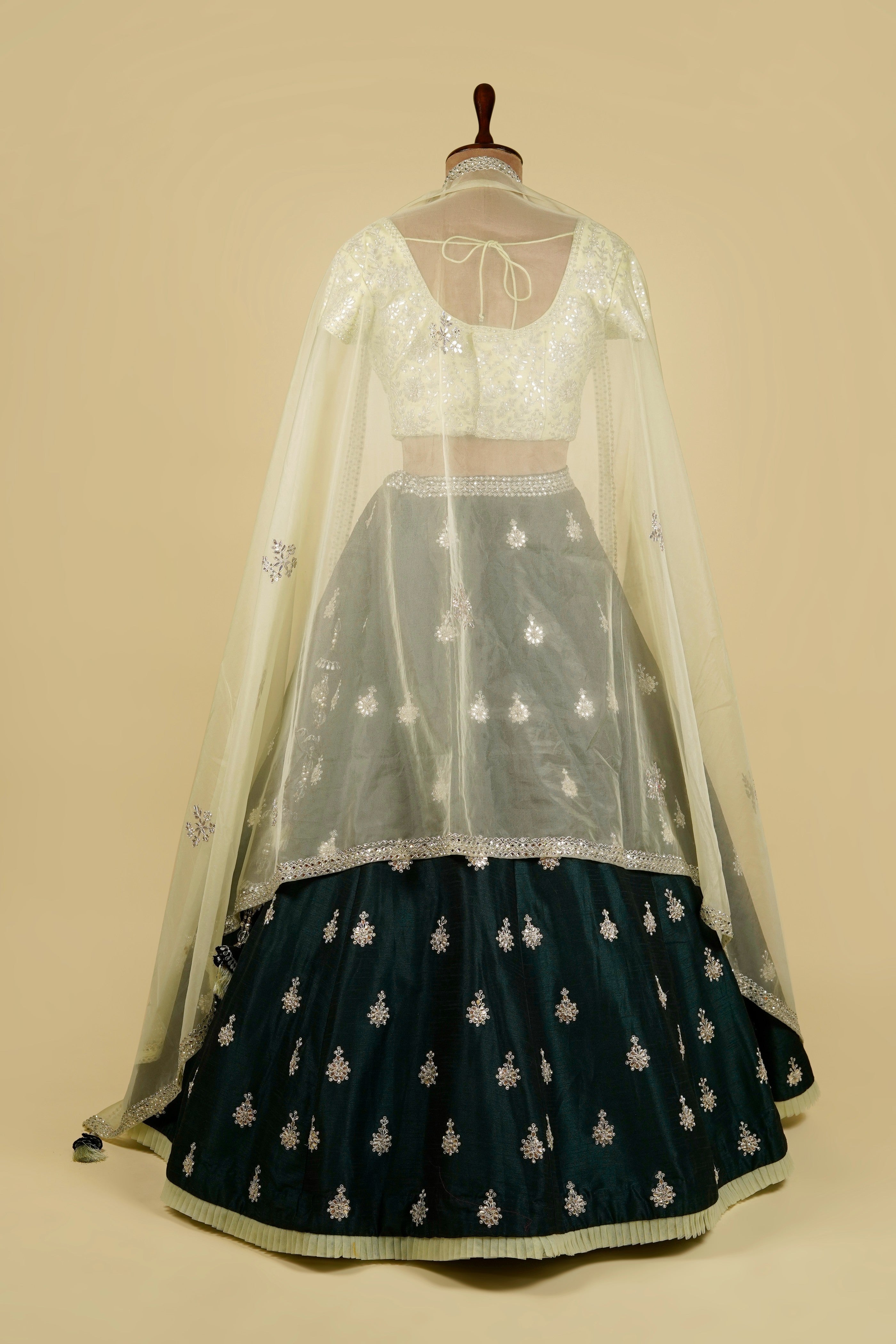 Lehenga Choli embellished with Gota patti, Mirror and Swarovski work